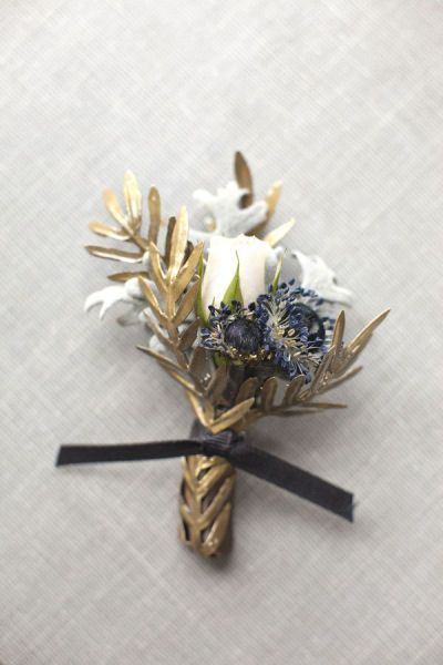 Navy & gold boutonniere from Mindy Rice by Aaron Delesie via Style Me Pretty