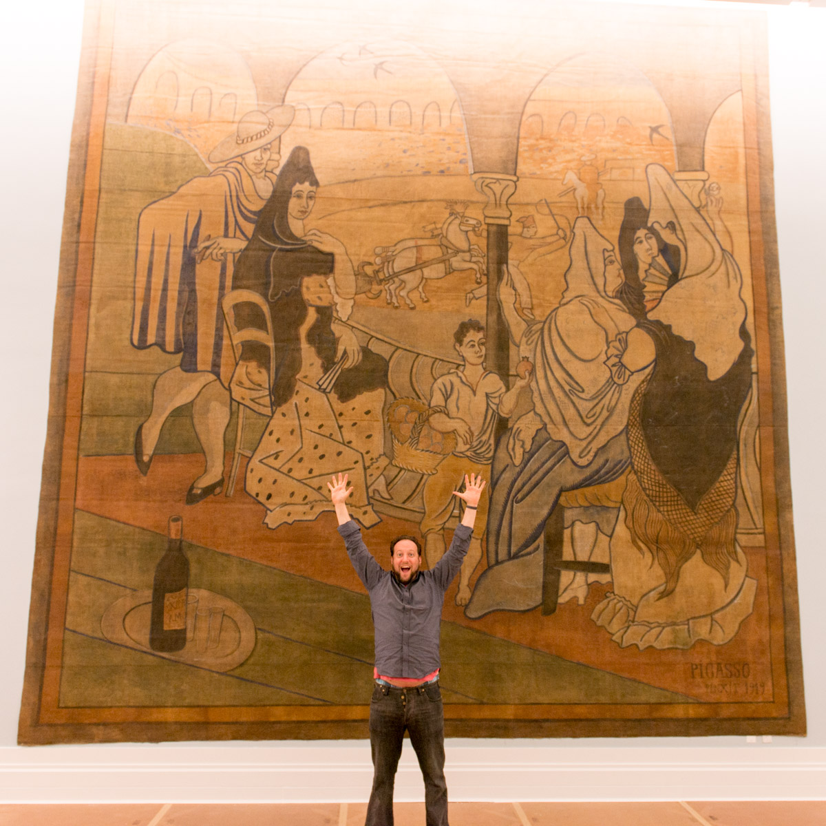 Jason gardner in front of the Le Tricorne curtain by picasso
