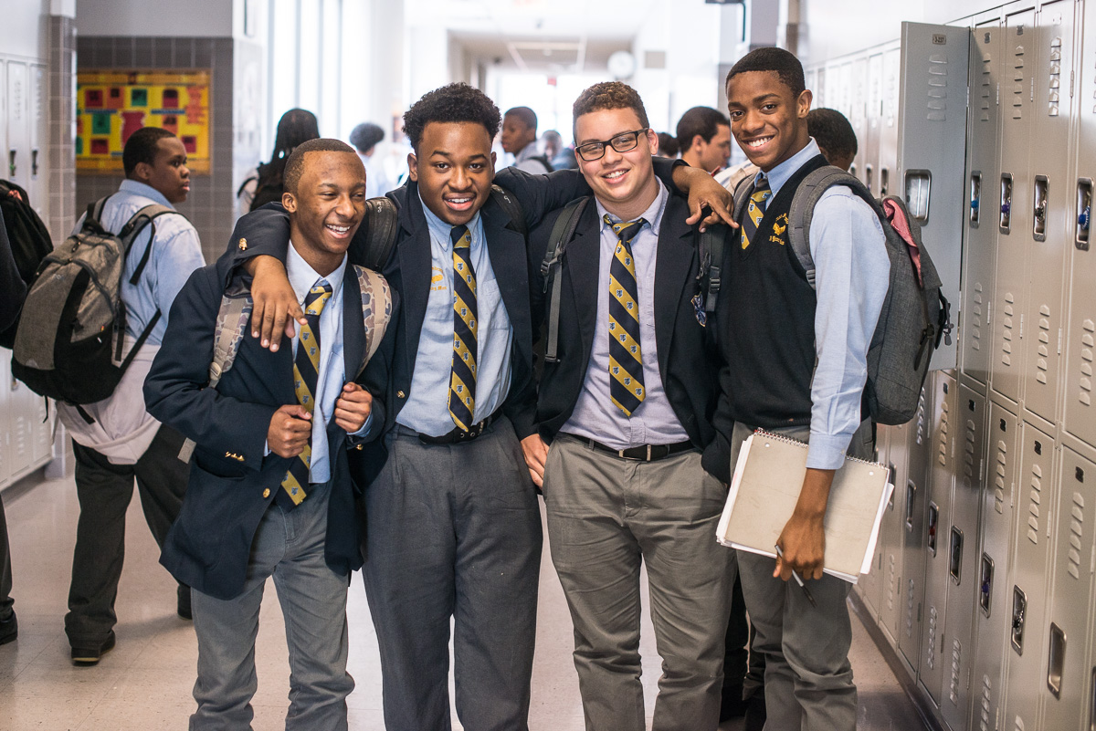 Boys laugh in between classes at Eagle Academy