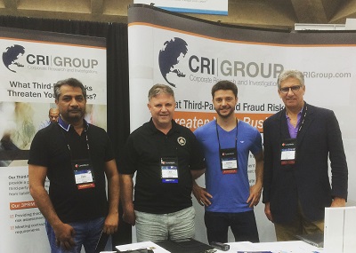 ACFE UK Chairman Jim Oakes, second-from-left, meets with CRI Group's Zafar I. Anjum, Dardan Abazi and John Dejesu.
