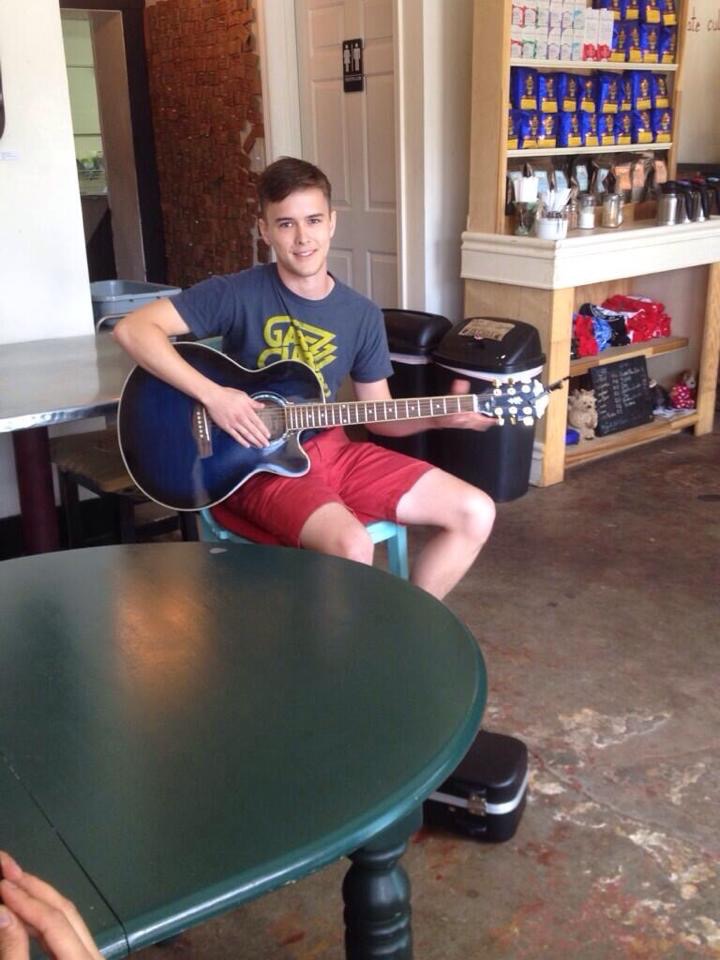 Zachariah serenading the shop one Saturday morning.