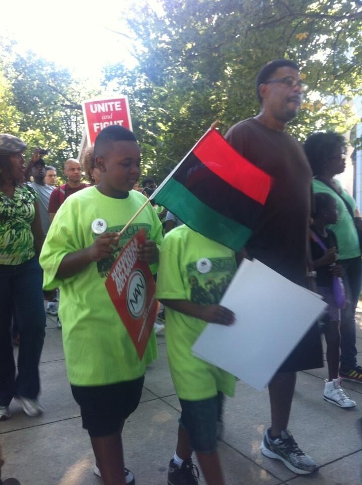 Young brothers heading to the reflecting pool. The Red. The Black. And The Green. Conscious and on point.