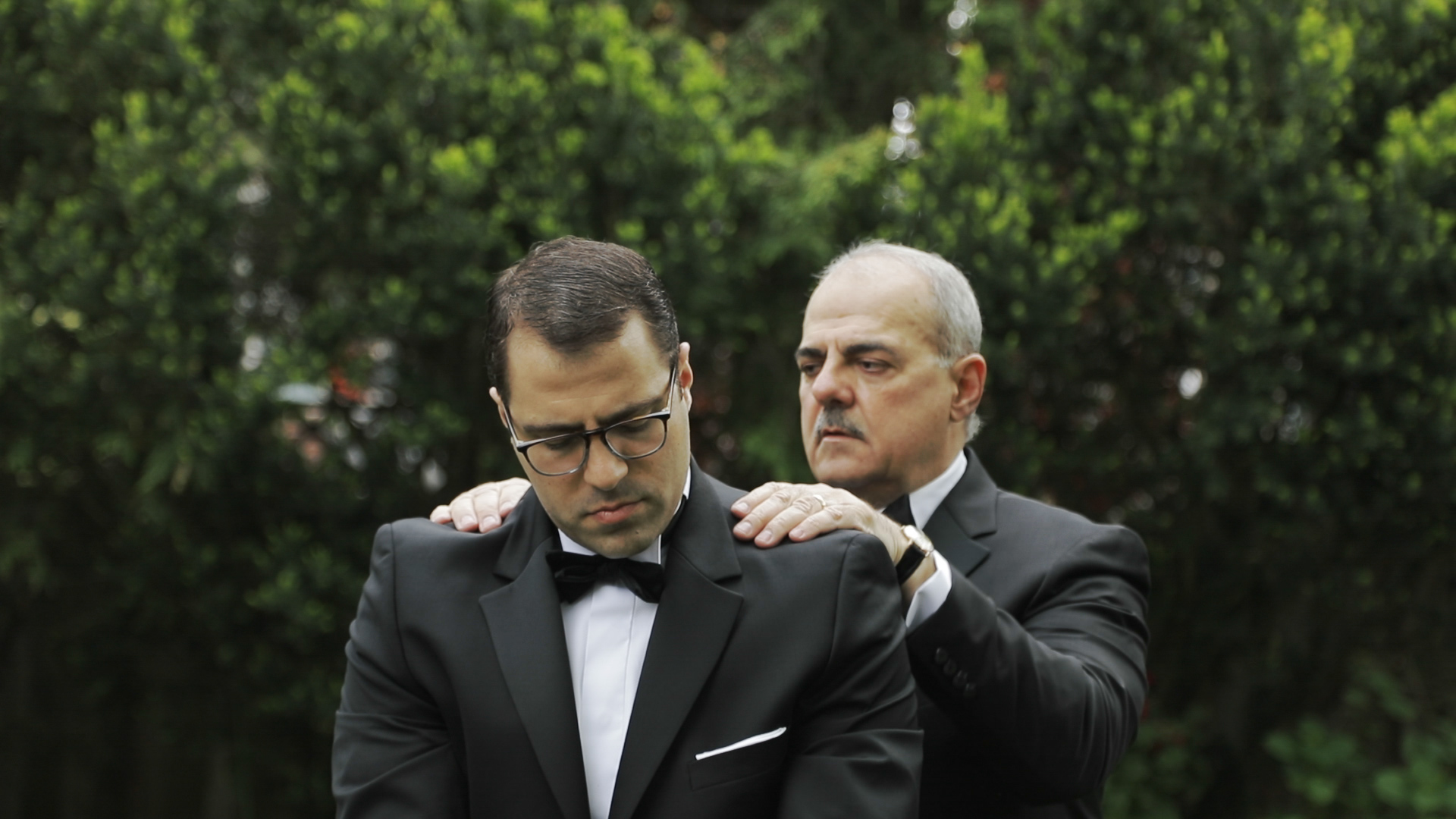 Groom and his father before the wedding