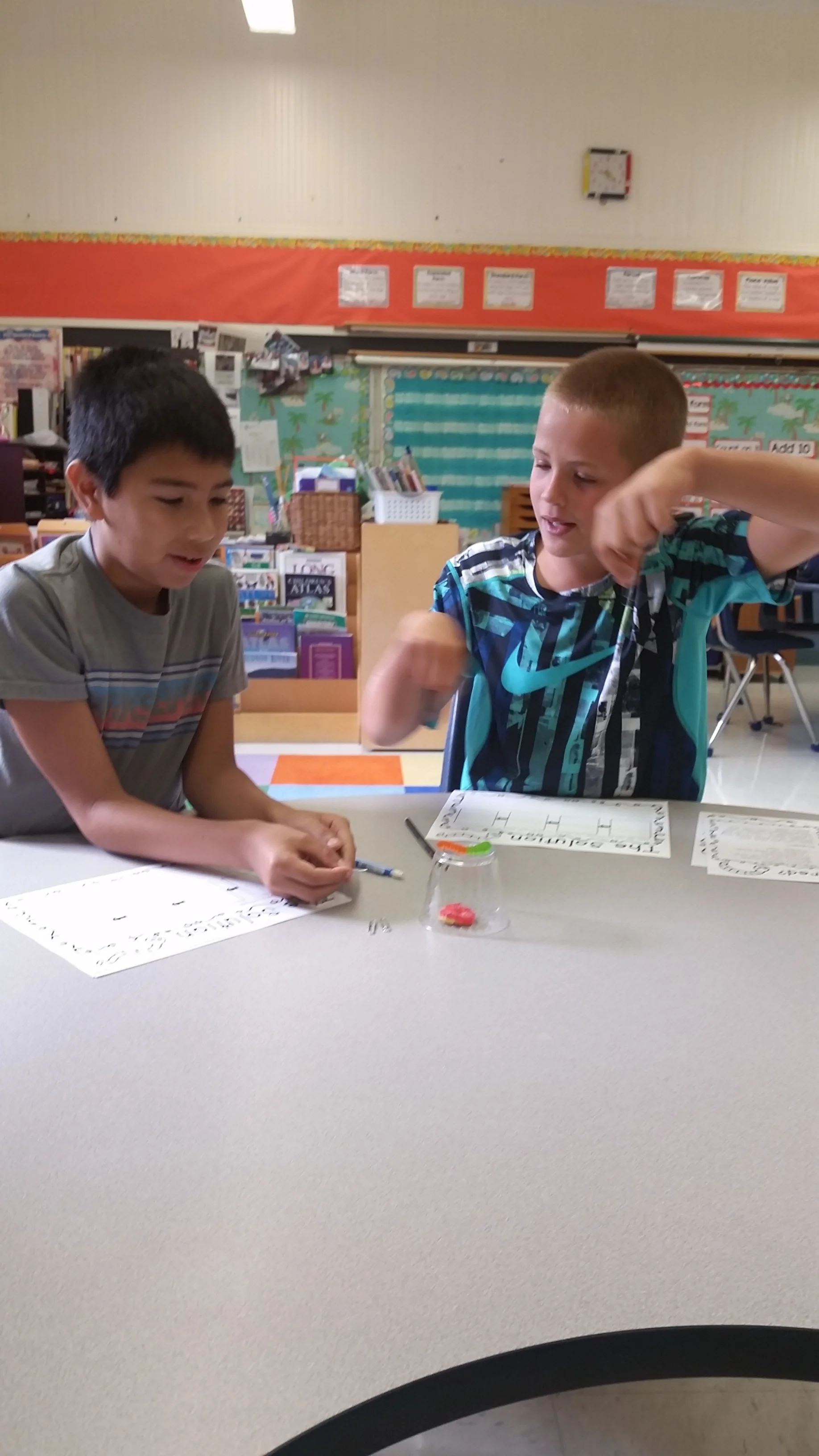 While trying to save fred, students can not touch Fred with their fingers or hands. They can only use 4 paper clips.