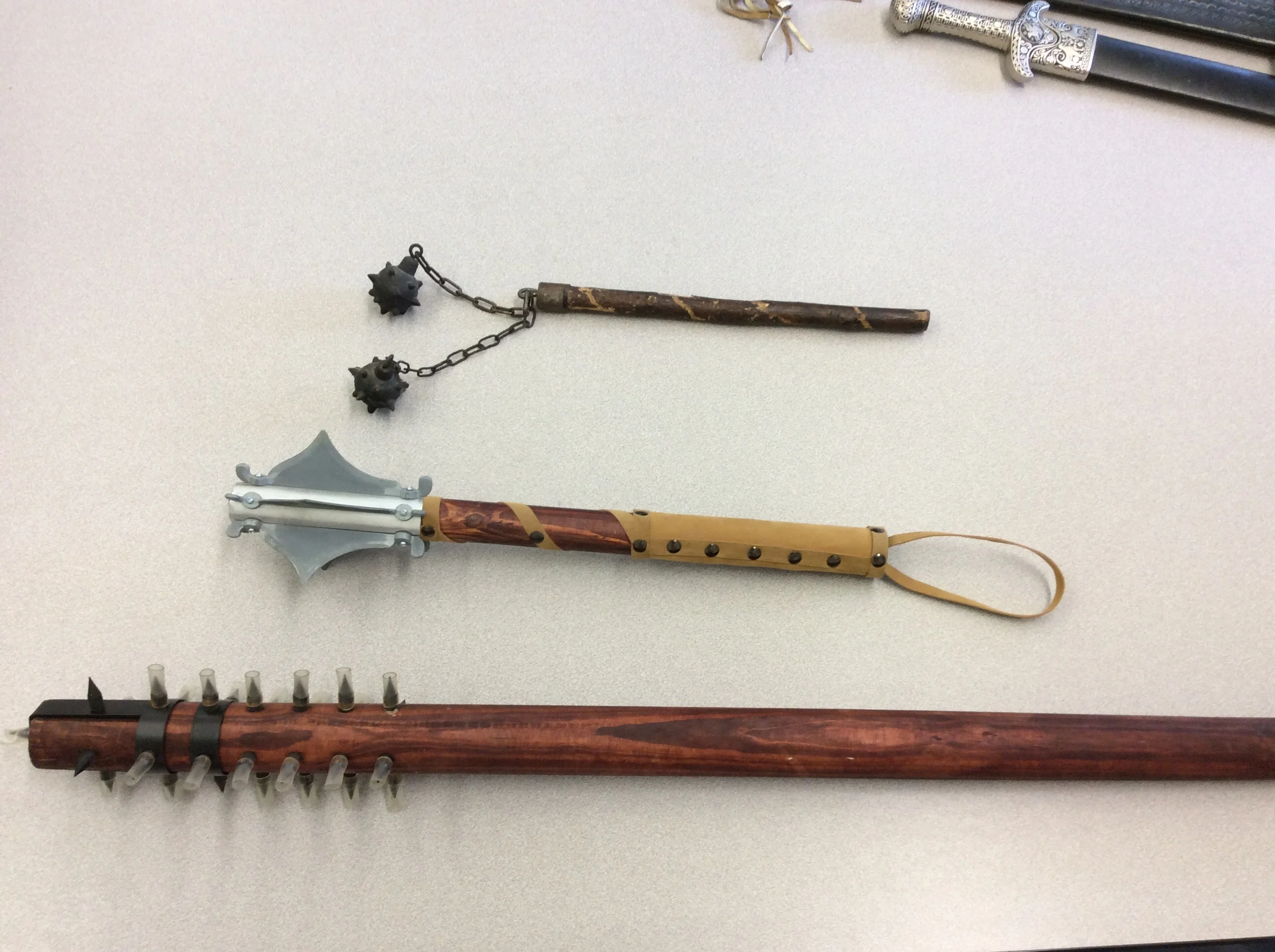 Top: Morning Star. Bottom two: Various maces