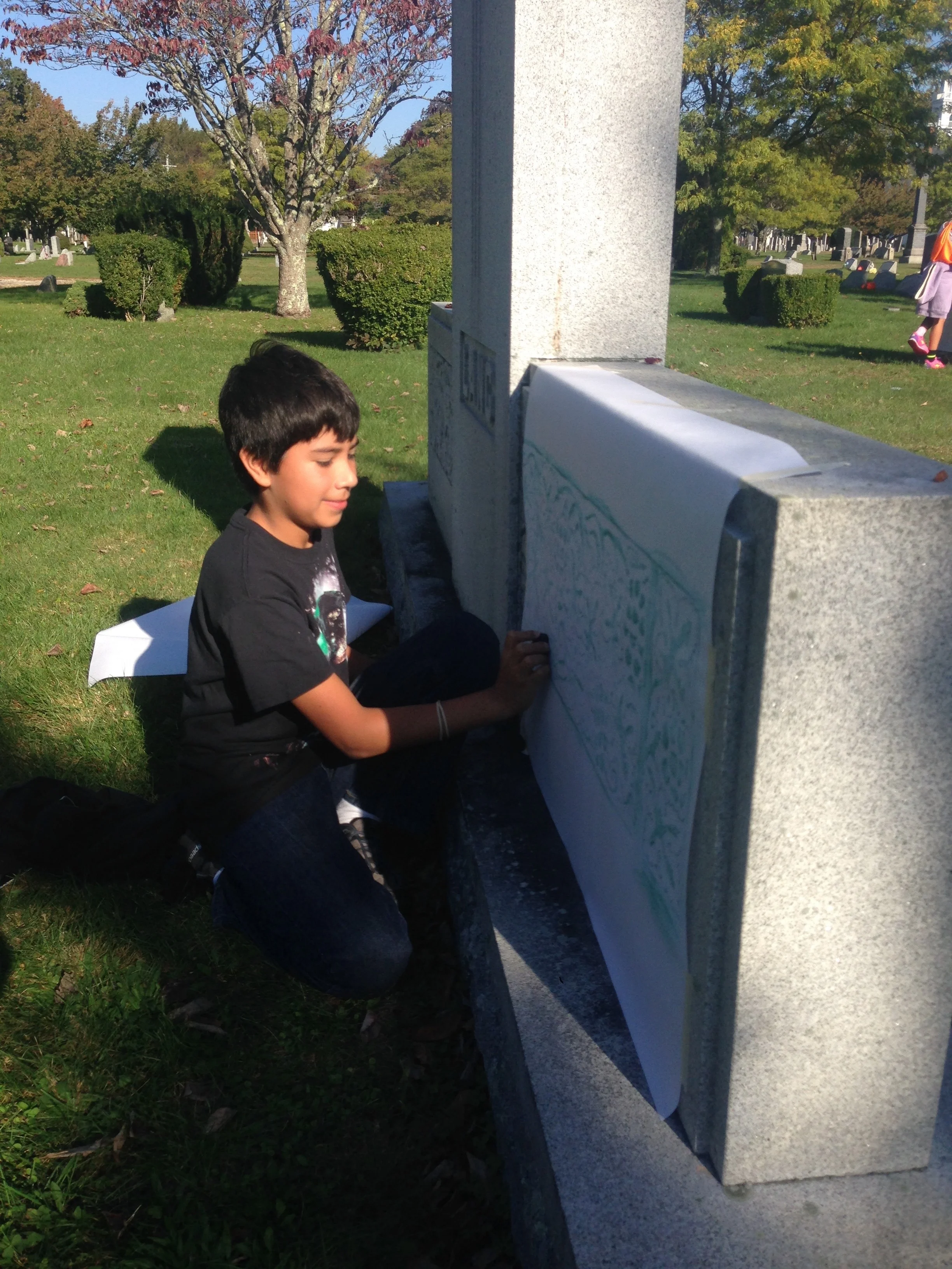 Joe chose to do a rubbing of a floral portion of this large monument