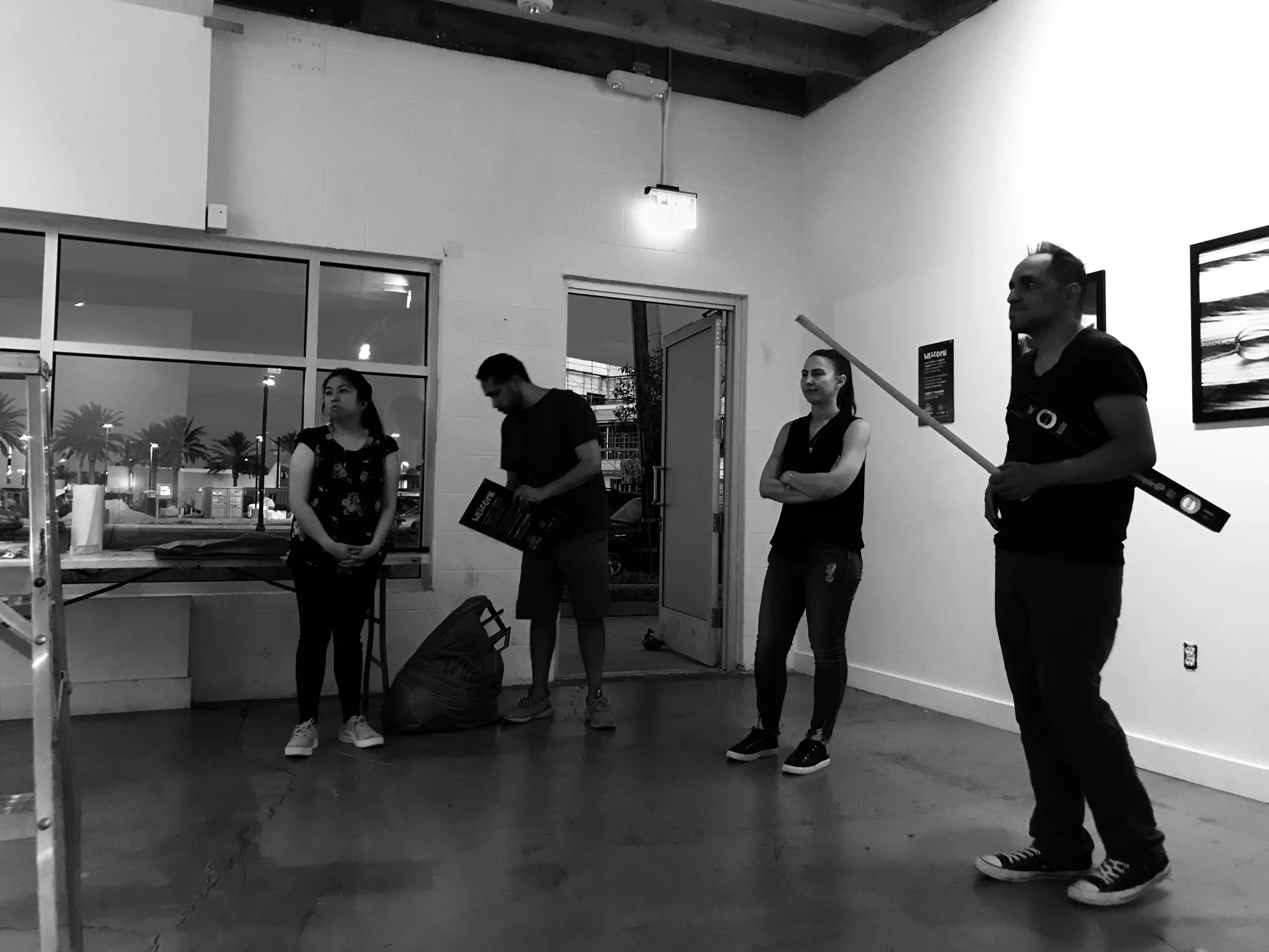 AIGA LV Board of Directors Therese Bautista, Juan Beltran, Jennie Marsh, and AIGA Program Director and Editor In Chief of VIM Magazine Jorge Lara planning at Escape Artist Studios.