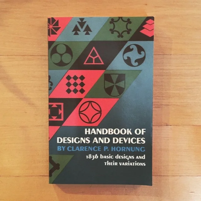 Handbook of Designs and Devoces by Clarence Hournung
