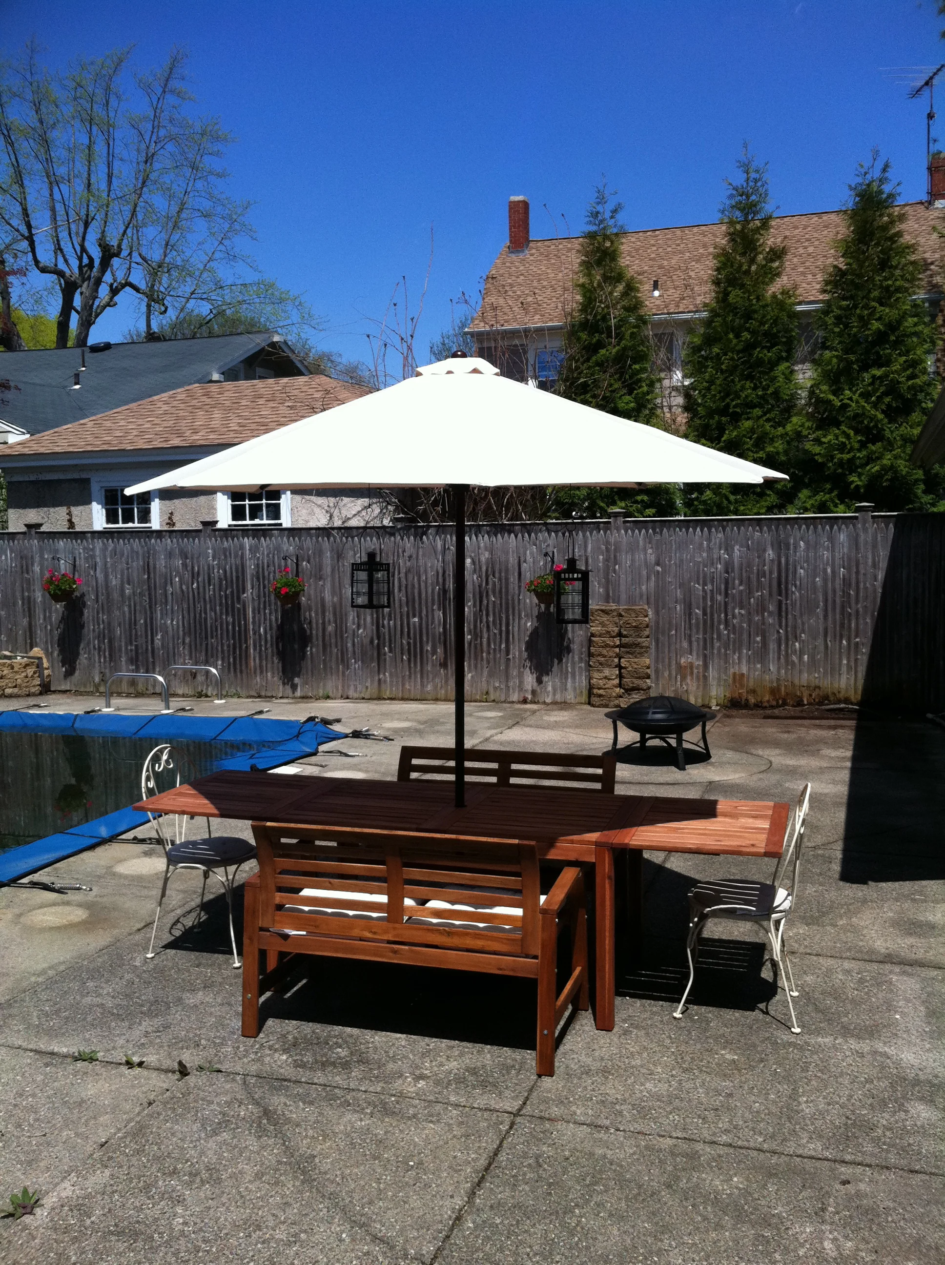 Summer One, after the purchase of the house, in which the entire back yard contained concrete, even the pool coping. 