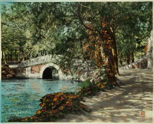 Bridge, Summer Palace, Beijing, before 1927, Tinted photograph. Object Number: B60M518 © Asian Art Museum Chong-Moon Lee Center for Asian Art and Culture This photograph shows two of the many picturesque bridges in the lake at the Summer Palace complex outside Beijing. Built in 1750 for the Qing dynasty's Qianlong emperor (r. 1735–1796), this complex comprises palaces, temples, pavilions, and gardens situated on and around Longevity Hill and the manmade Kunming Lake. The lake occupies more than threequarters of the total complex area. Bridges of different shapes and sizes connect the artificial islands on the southern part of the lake. The islands and shores separate the lake into sections in which were created different views referring to scenic locations elsewhere in China. This treatment of landscape gardening exemplifies a practice made famous by the Qing emperors—that of "borrowing a scene."