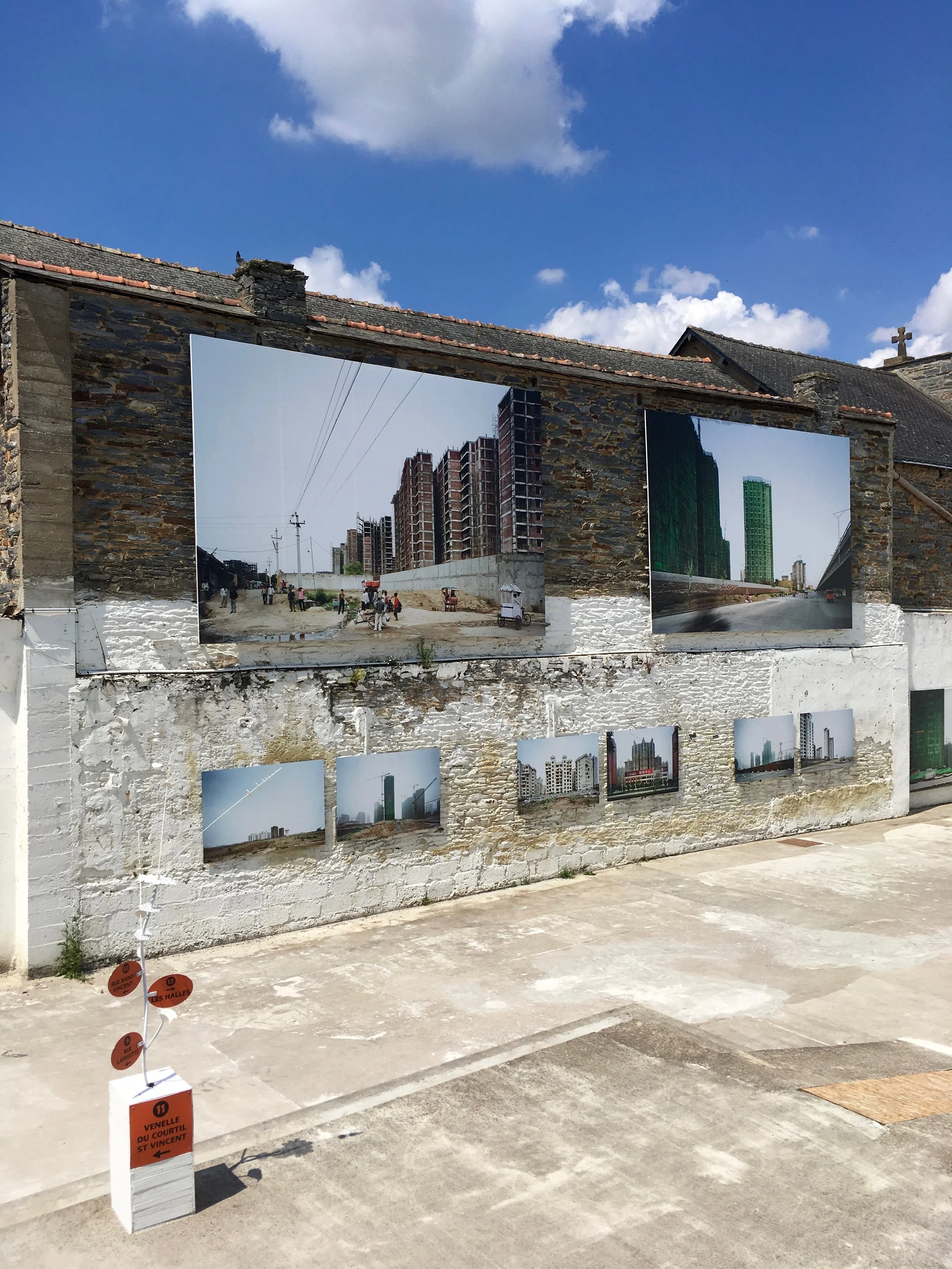Patrick Tourneboeuf, "Next City" series, exhibition view at Festival Photo La Gacilly 2018 © Marine Cabos-Brullé