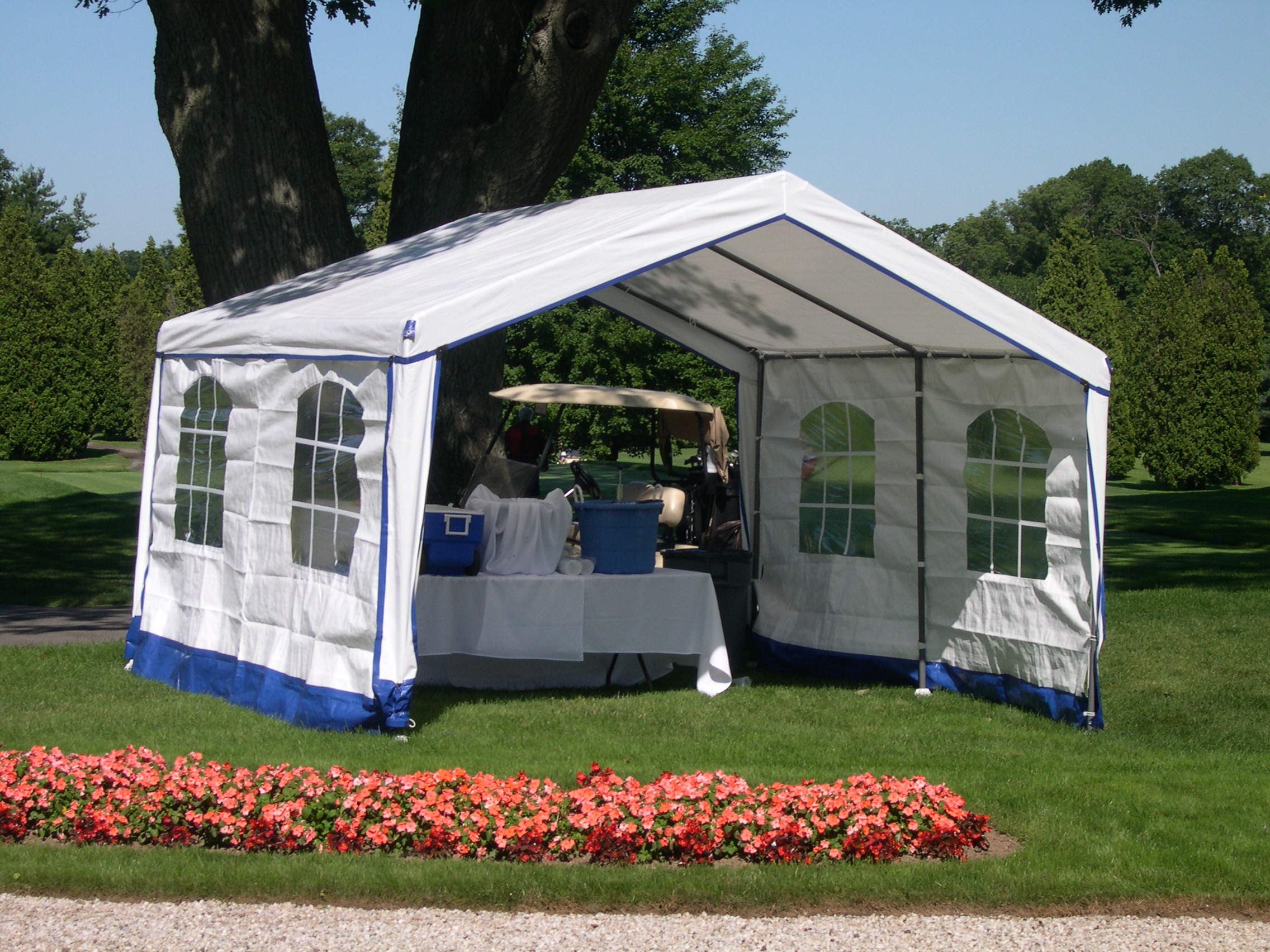 14x14x9 party canopy with flowers in front.jpg