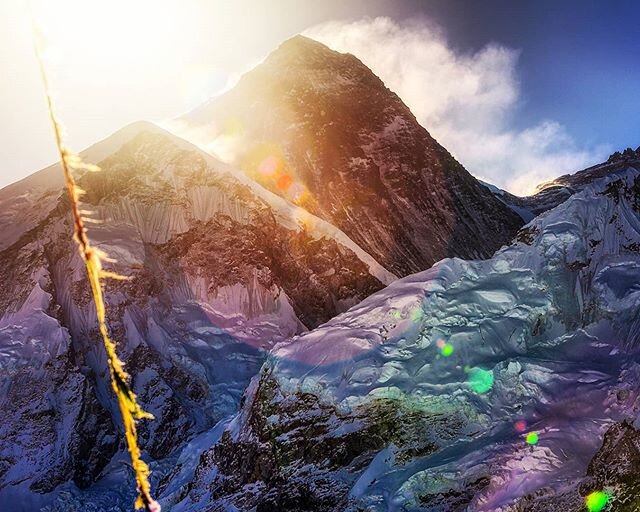 Mount Everest, in all of her early morning, lens-flared, and over-saturated glory...
.
I took this photo on April 19th 2015, a mere six days before the catastrophic earthquake hit Nepal, resulting in the substantial loss of both human lives, entire v