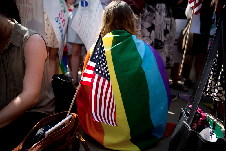 Many gay rights supporters and advocates wait outside the Supreme Court for the DOMA decision (Defense Against Marriage Act). The Court eventually ruled the Federal Same-Sex Marriage Ban, Unconstitutional.