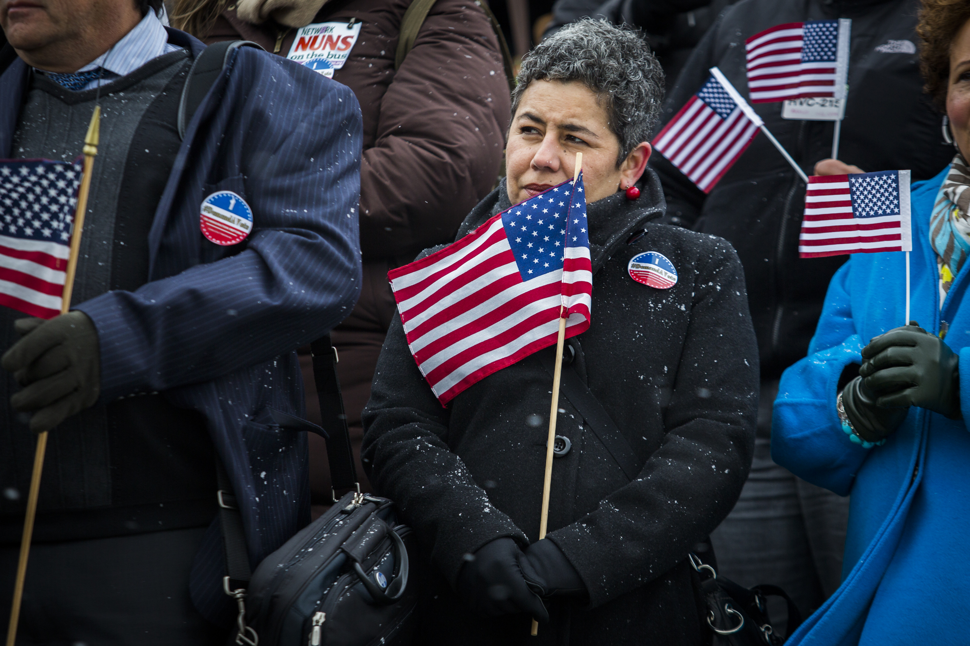 On Wednesday March 26th 2014, House Democrats held a media event to announce a petition to demand a House vote on immigration reform. People gathered, with American flags, to show their support. 