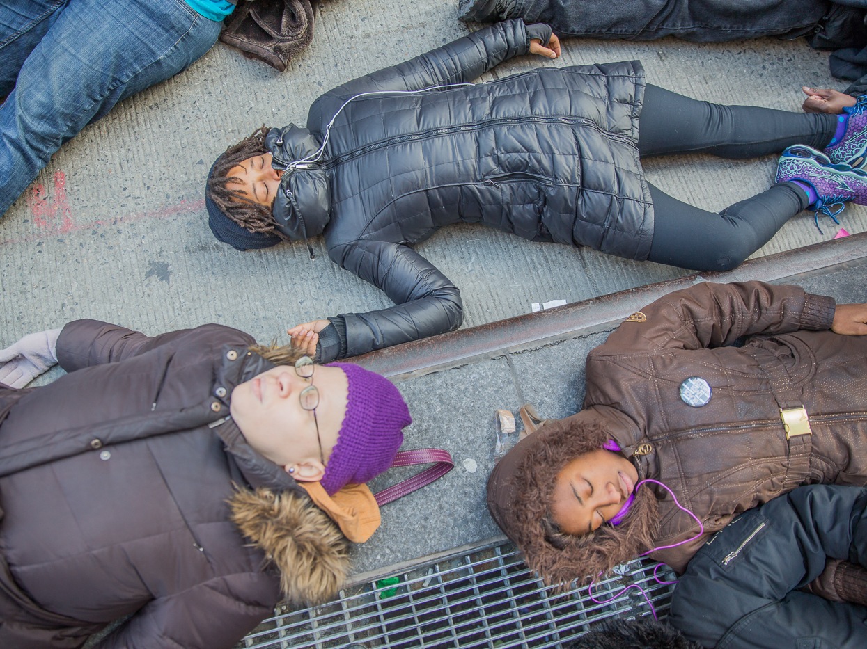 Die-In held on January 2, 2015, in front of The American headquarters of Fox News in New York City, to boycott Rupert Murdoch and his acquisitions, the New York Post and the Fox News Corp. This protest is in response to the supposed bias, racisism and misrepresentation of facts when these news agencies report on police brutality, specifically the death of Eric Garner on July 17, 2014.