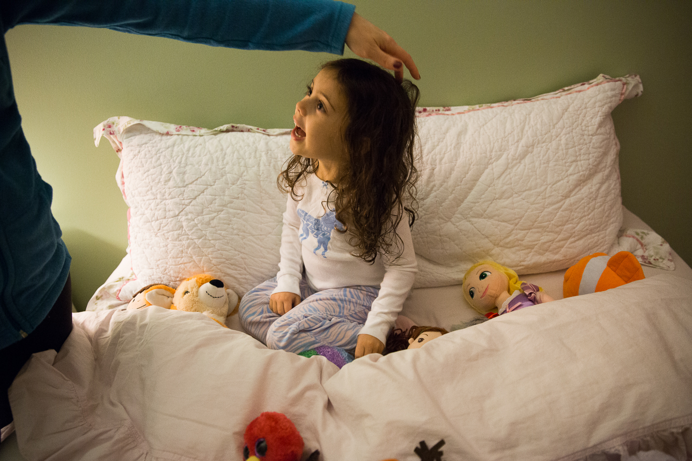 Jessica Rum, Eva's mother says goodnight to Eva after she said goodnight and tucked in all of her stuffed animals.