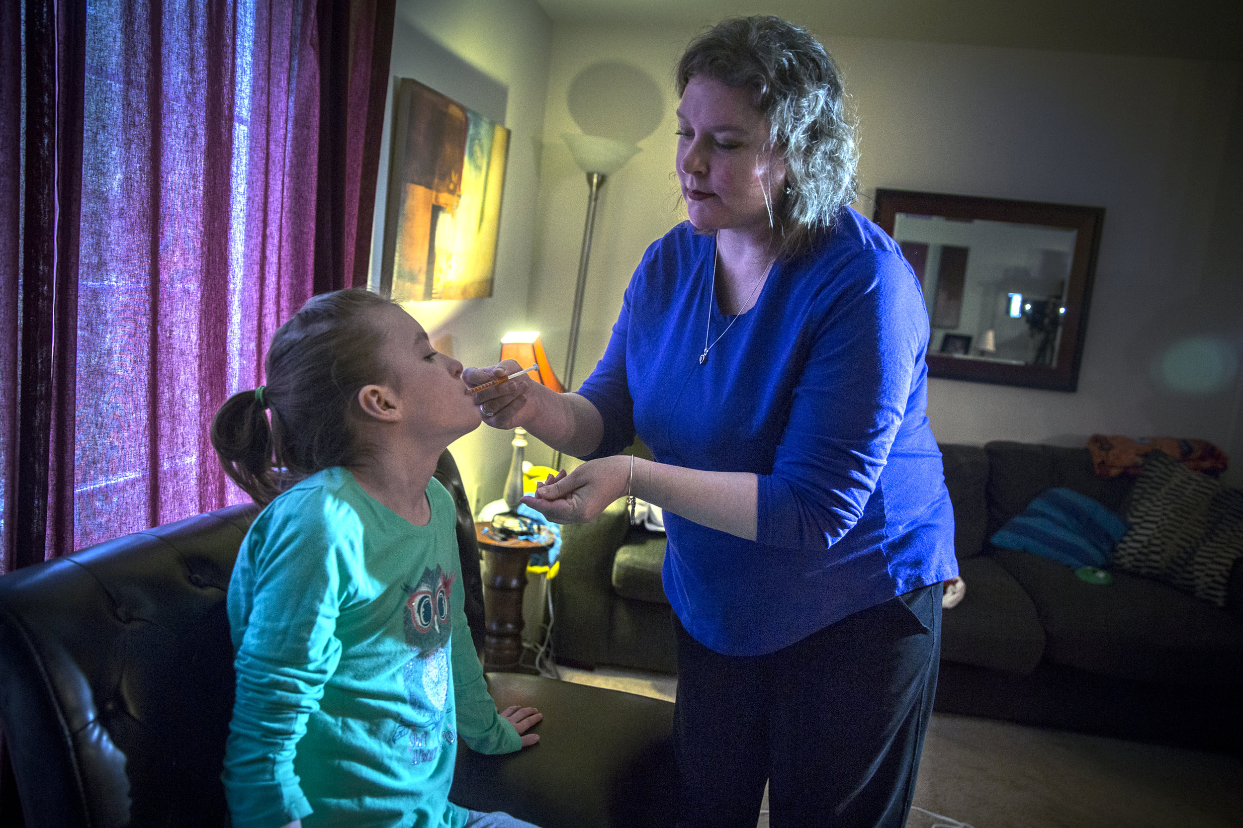 Cara Tarrricone gives her daughter, West, one of her two daily doses of Cannabis oil. Though the medical cannabis for kids bill was legalized in October, it took until March for the Tarricone's to receive the medication. The goal is to give West three doses a day, but there needs to be eight hours between doses, so the amount of doses depends on how early West wakes up in the morning. 