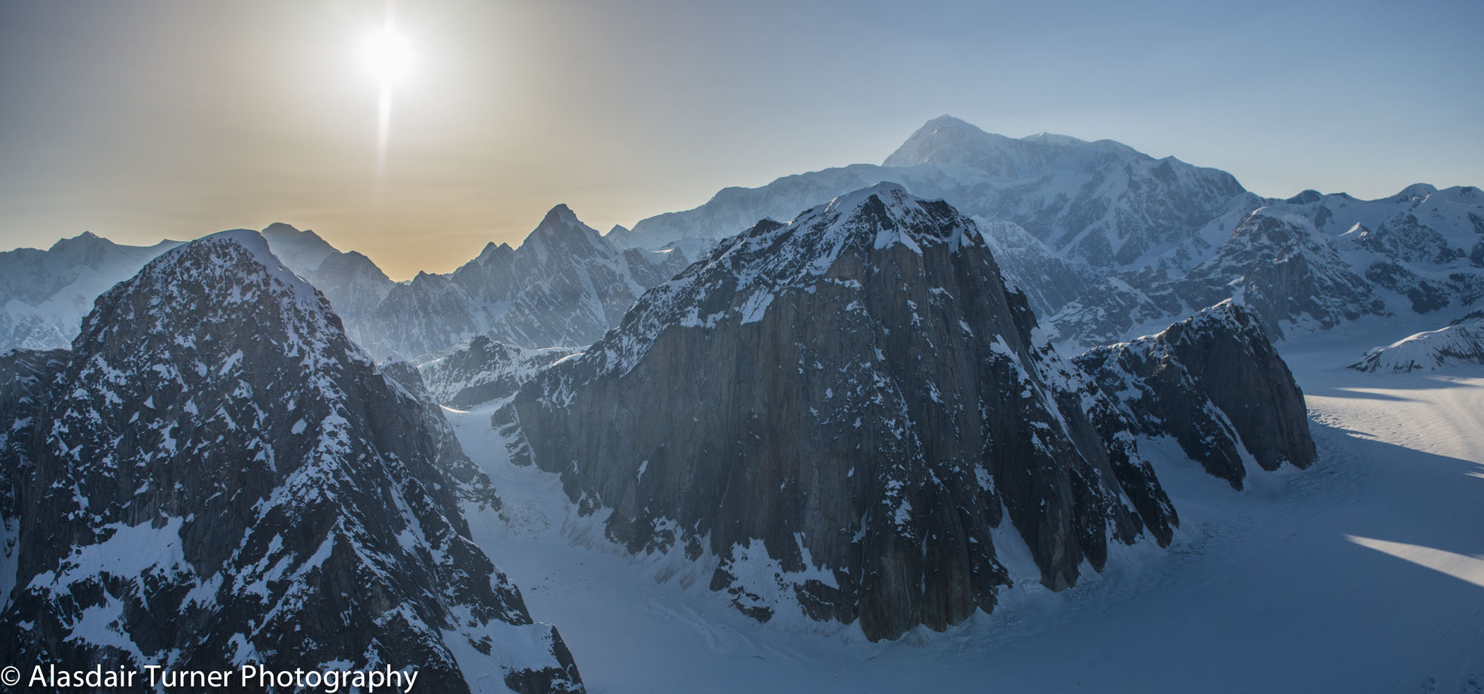 The Ruth Gorge with a golden hazy pollution layer filtering the sun. Click on the image to purchase.