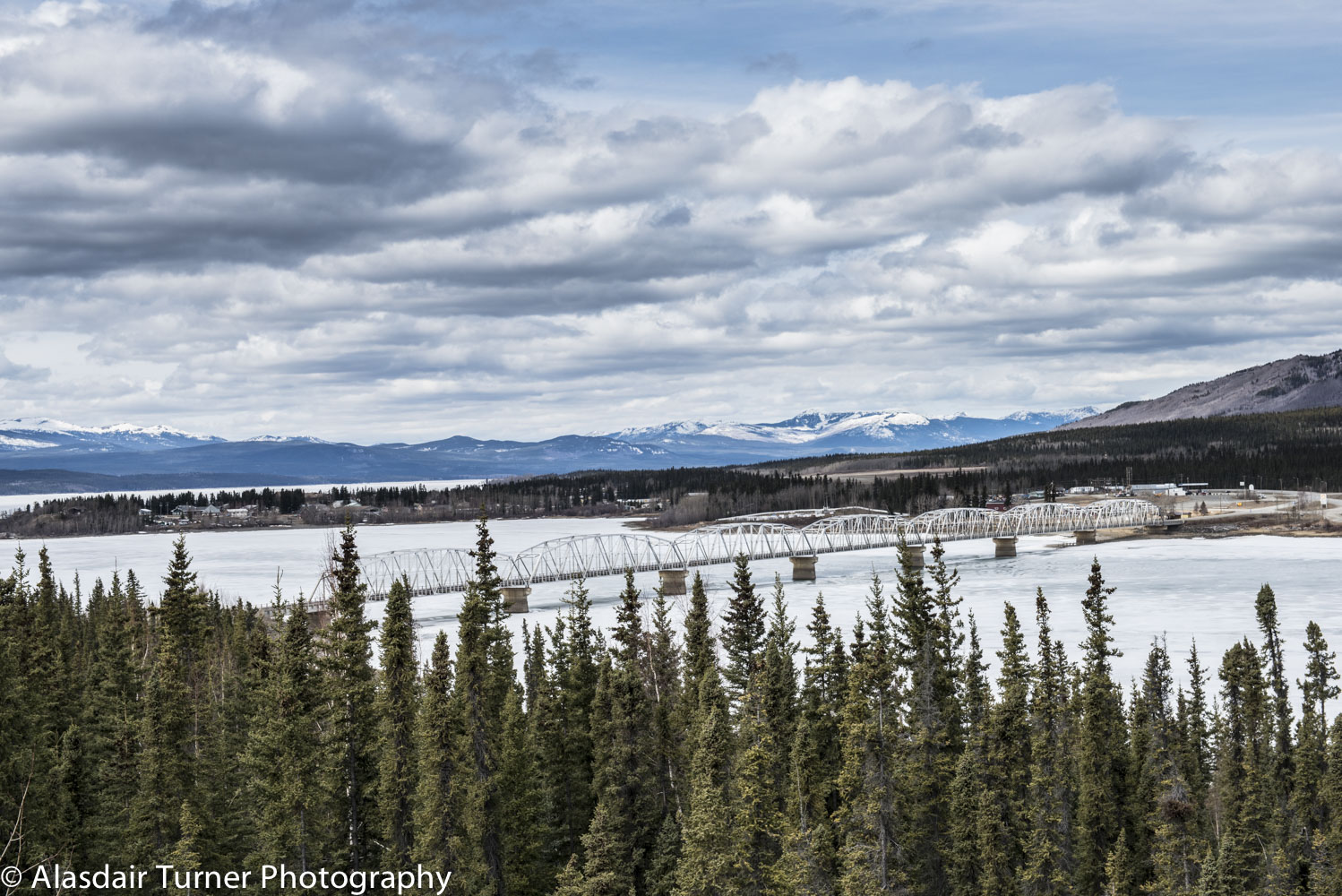  Crossing the still frozen Yukon River. 
