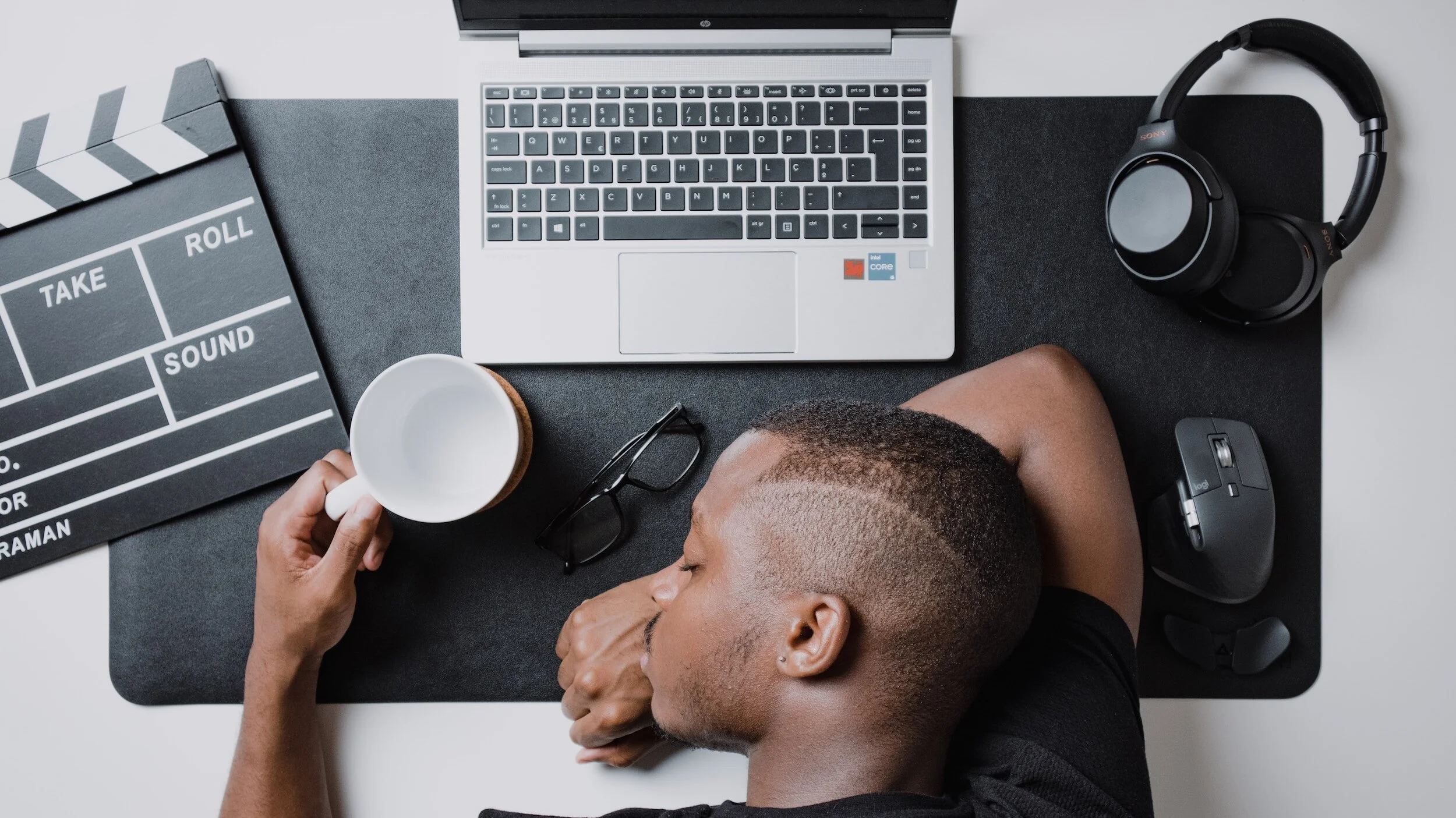 5-Minute Rule for Procrastination: A man asleep at his desk.