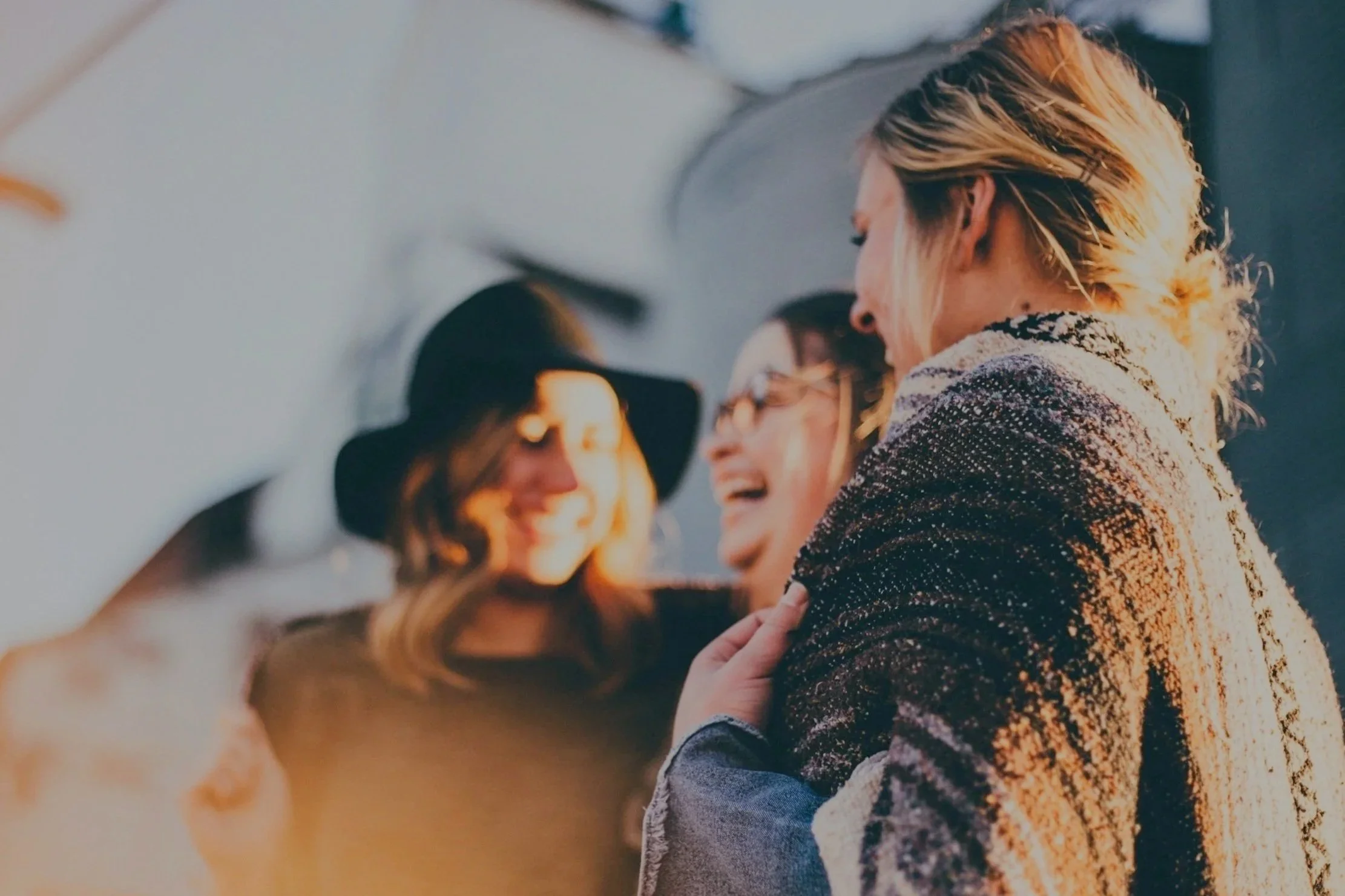 CBT for Social Anxiety: Three women laughing together