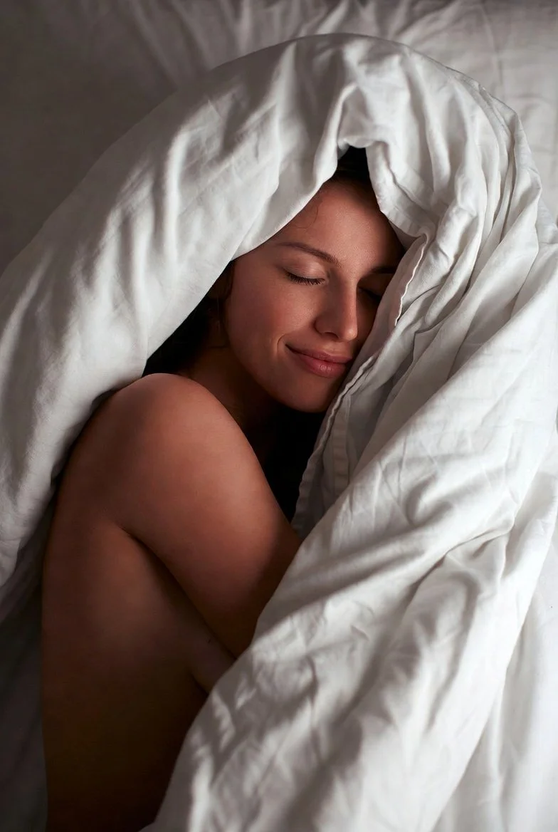 CBT for Insomnia: Woman sleeps blissfully in bed