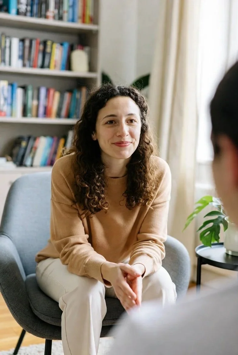 Psychologist explaining ADHD testing and CBT treatment options to an adult client
