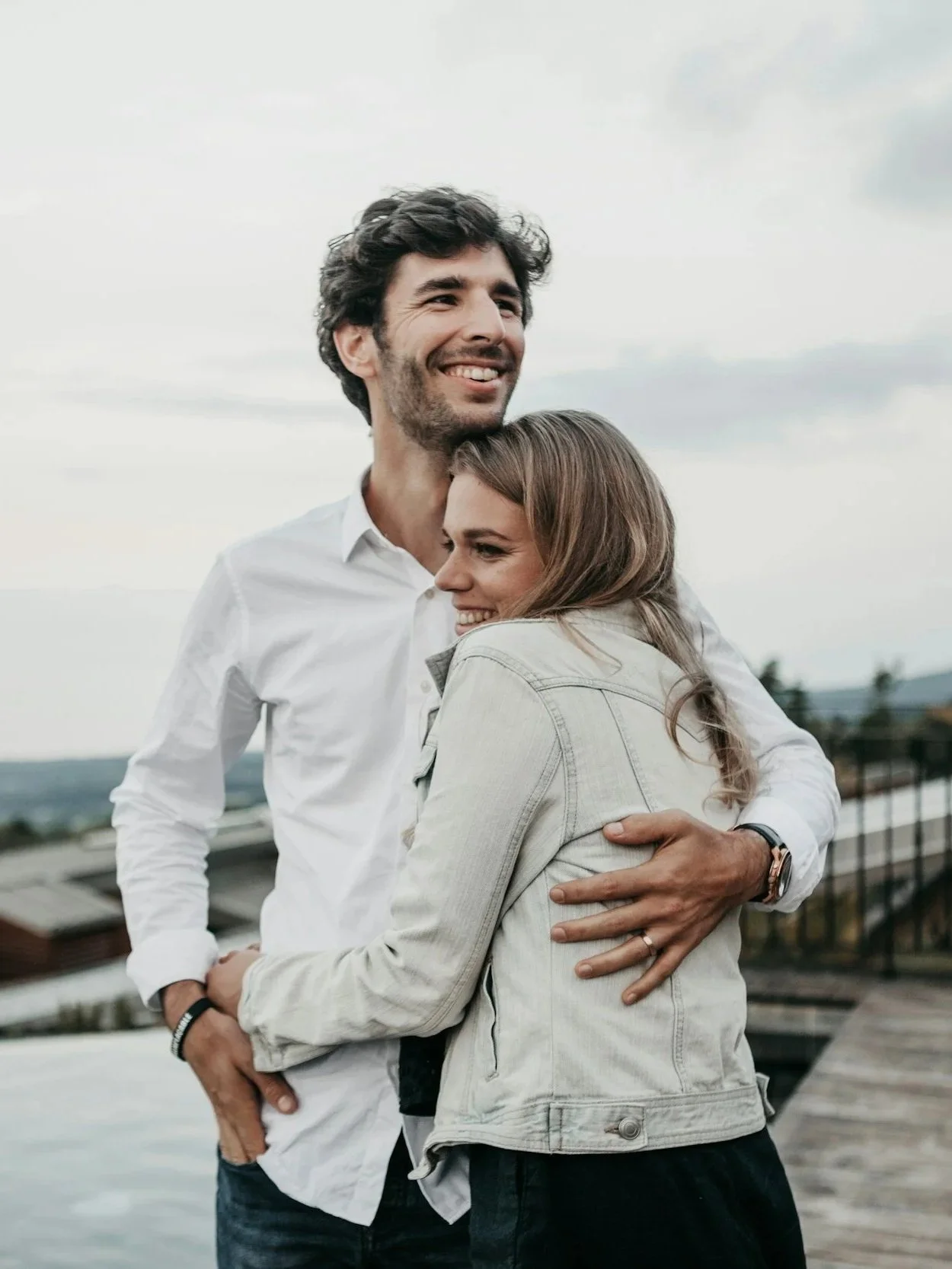 Couples Therapist in Los Angeles: A male and female hold one another outdoors.