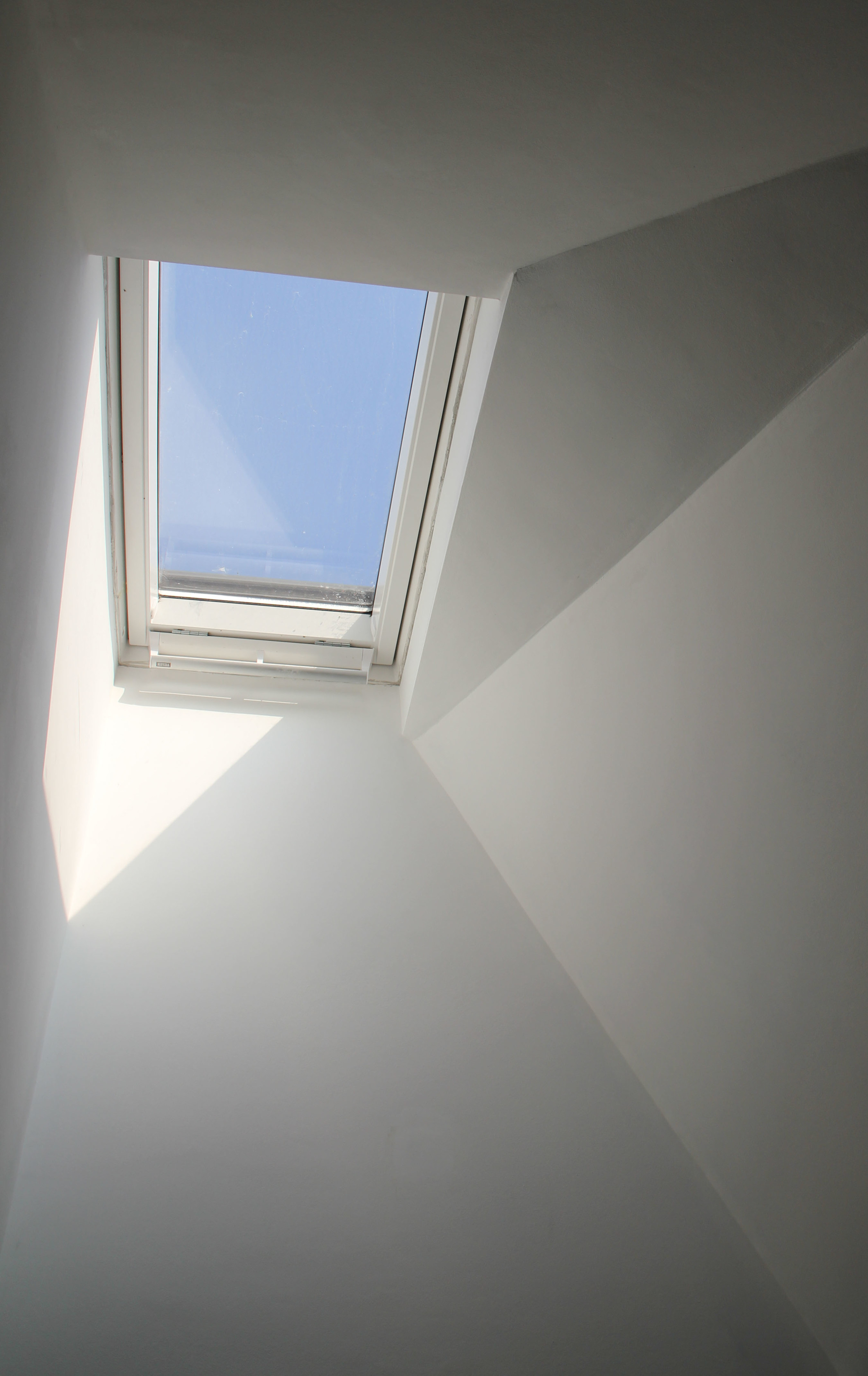 Splayed ceiling to new rooflight to existing house