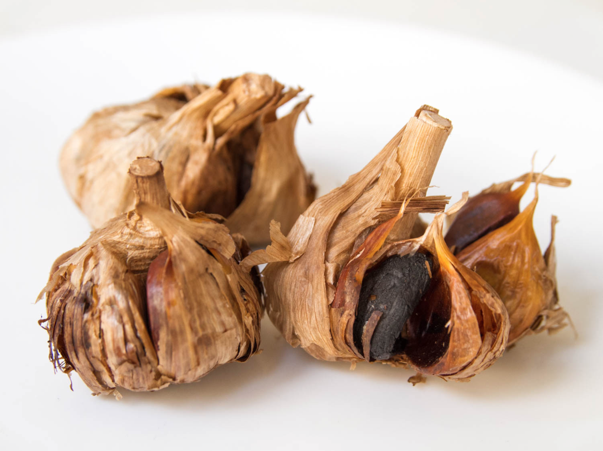 black garlic bulbs.png