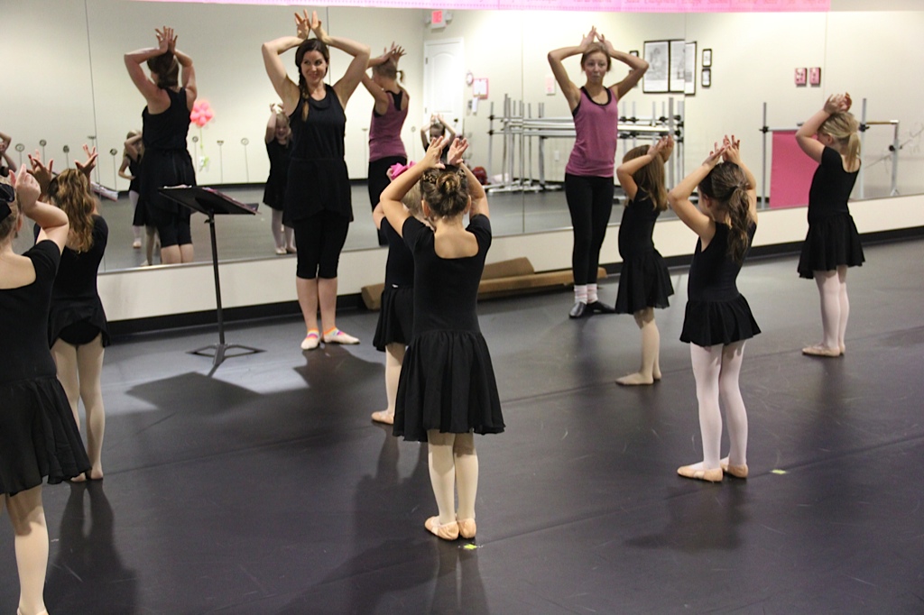  The dancers think it's very funny when they pretend to have flamingo feathers on their heads.&nbsp; 