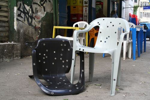 Stray Bullet Chairs on the street