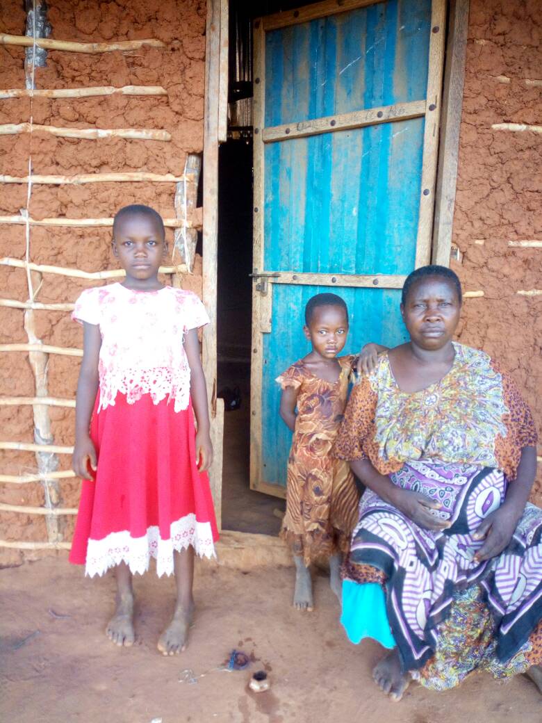 Waridi with her sister and their grandmother. 