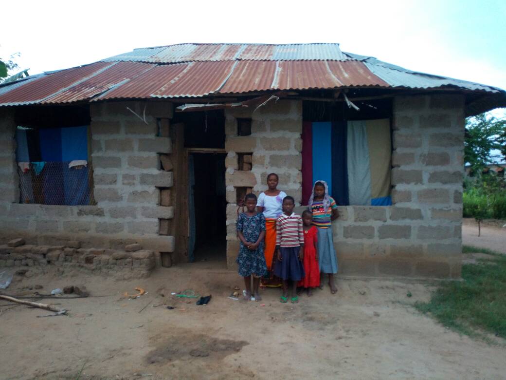 Gladness with her family, but her father and brother they were away when I visited them.
