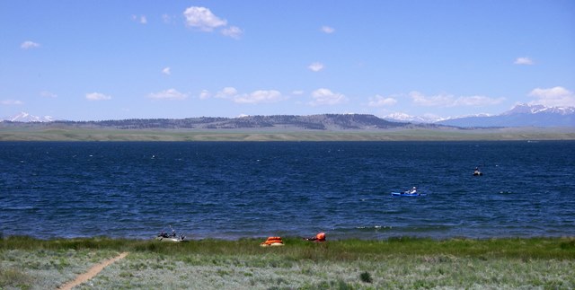 Float tubers and light water craft head to shore when the wind kicks up on Spinney Mountain Reservoir.
