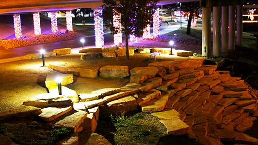 COMPLETED PLAZA NEXT TO 87S BRIDGE - AT NIGHT