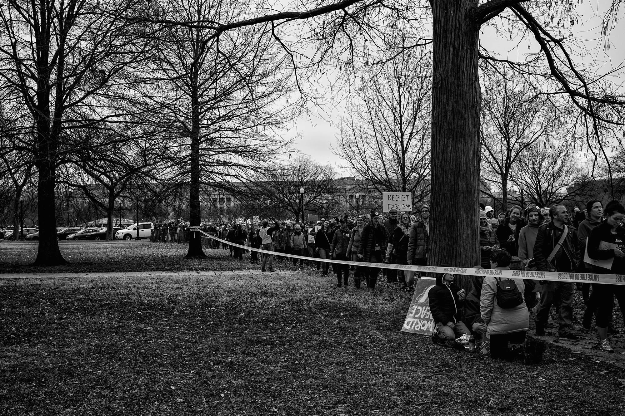 Demonstrators convene on the Ellipse at the conclusion of the Women's March in Washington, DC on January 21, 2017.