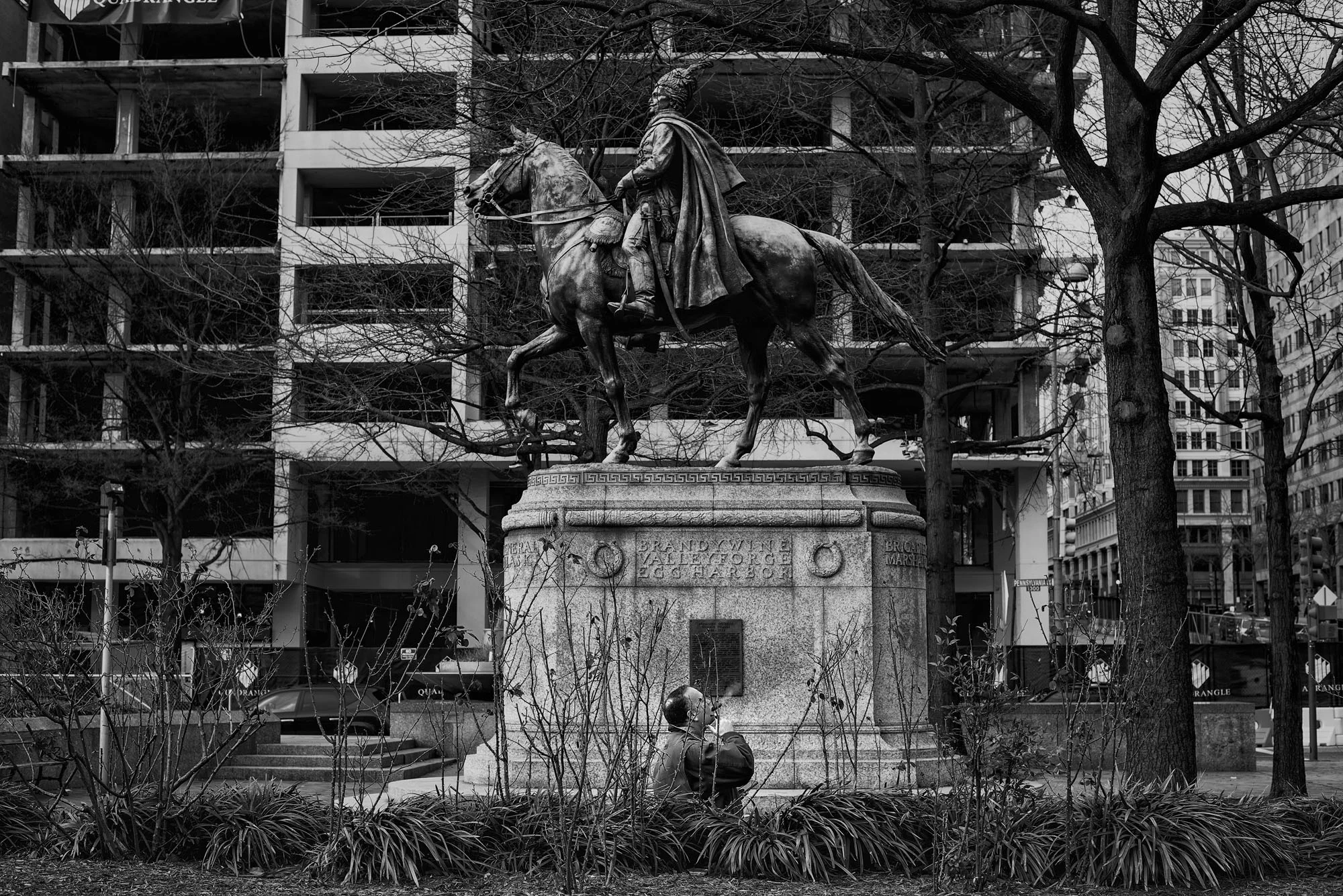 A man smokes a cigar at Freedom Plaza in Washington, DC on January 29, 2017.