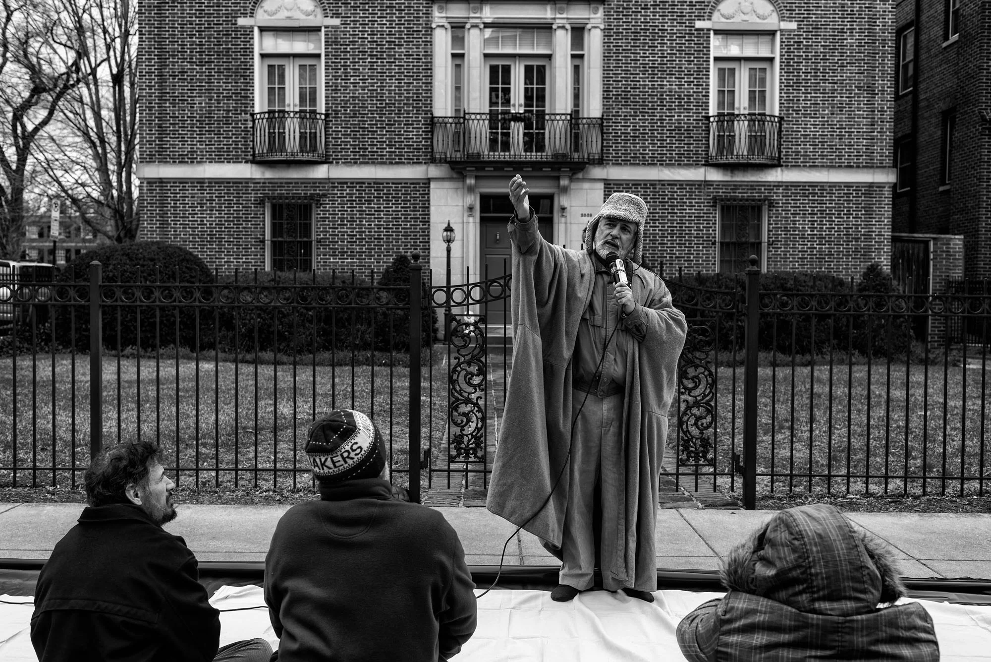 Imam al-Asi leads a group in prayers outside the Islamic Center of Washington on February 3, 2017.
