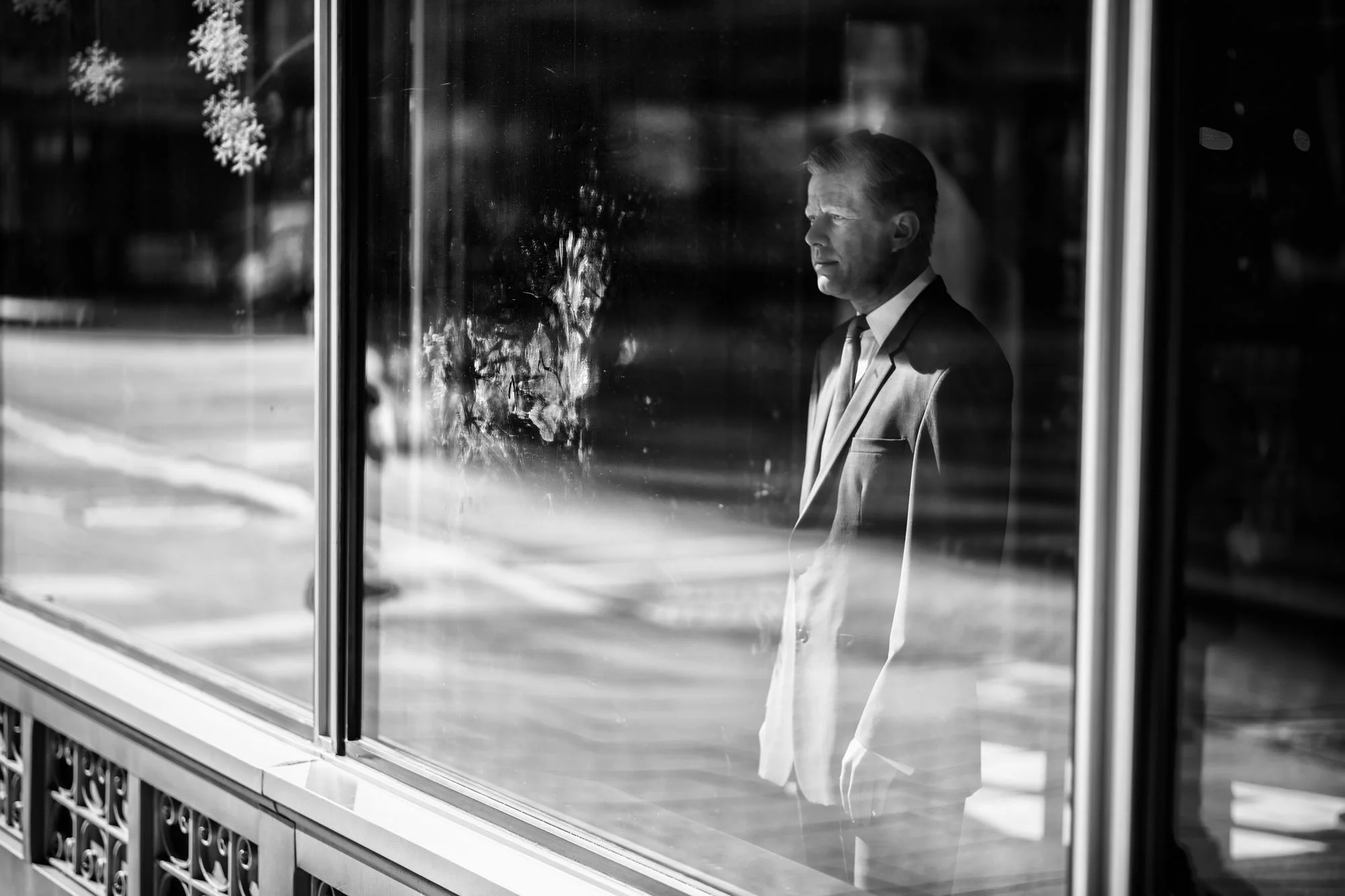 A wax figure of President John F. Kennedy faces out a window in downtown DC on February 6, 2017.