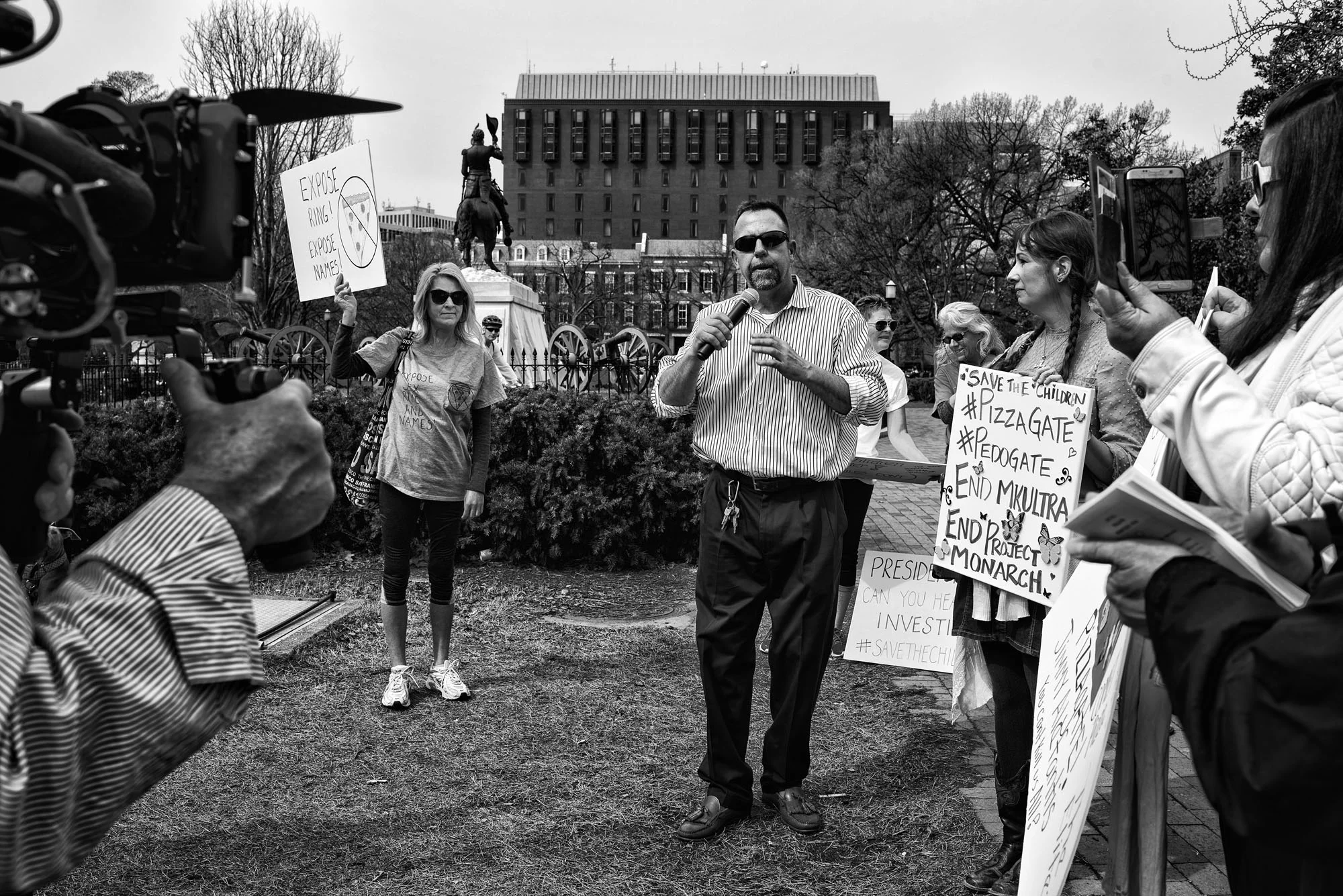 A pro-Pizzagate rally in Lafayette Square in front of the White House on March 25, 2017. Speakers demand an investigation into unfounded claims that a child sex trafficking ring is somehow connected to Comet Pizza, a local pizzeria in Washington, DC.