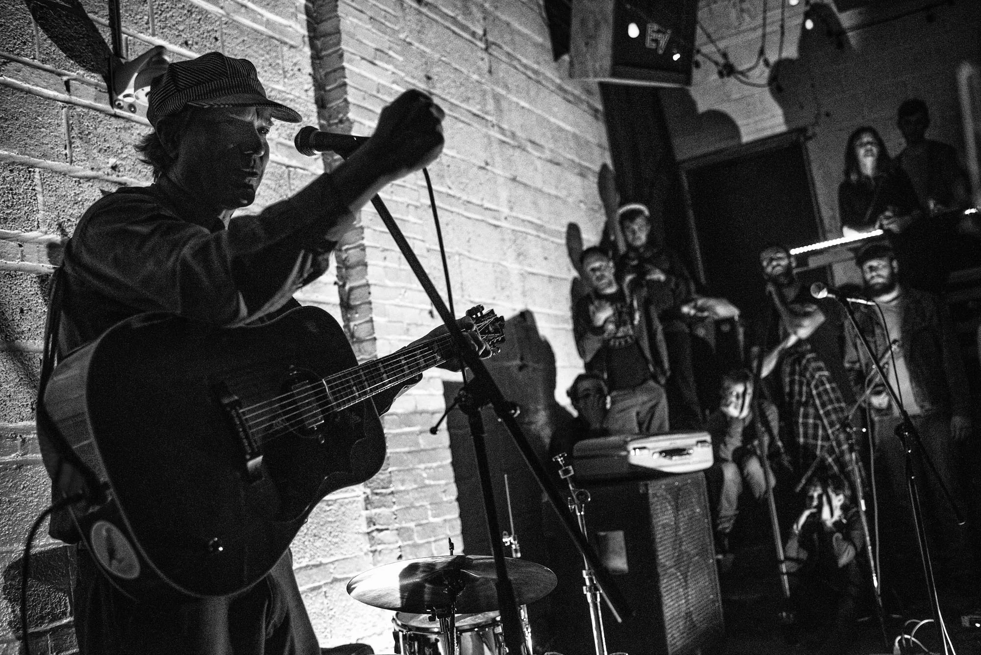 Musician David Dondero performs at Comet Pizza on March 26, 2017. In December, 2016, a gunman entered Comet Pizza, firing at least one shot inside the restaurant before surrendering to police. The gunman claimed that he came to Comet to investigate the unfounded claims of child trafficking.