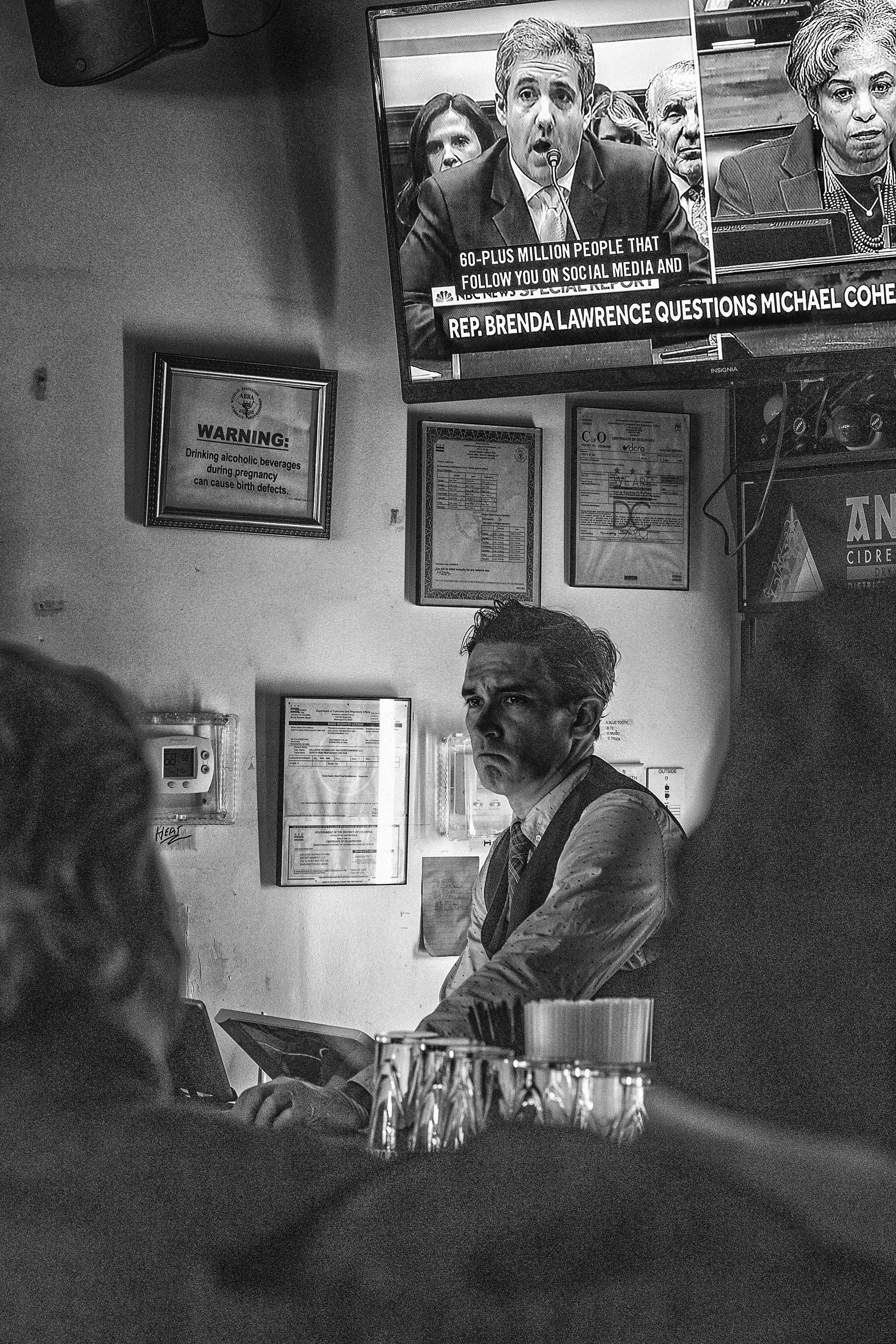 Day 769: People watch the testimony of Michael Cohen, former attorney to US President Donald J. Trump, at Duffy's Irish Pub in Washington, DC on February 27, 2019.