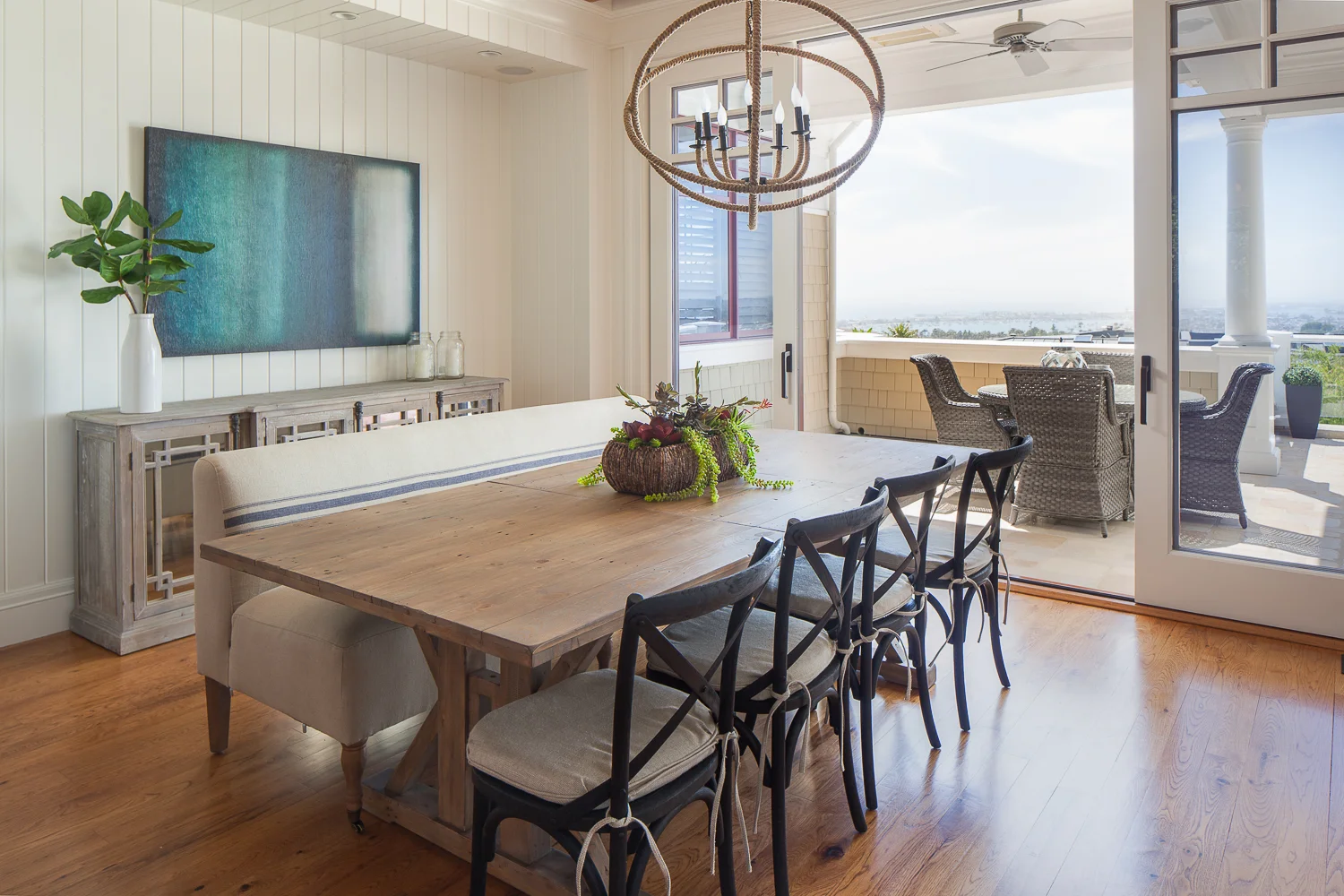 Staged dining room with great indoor outdoor flow. 