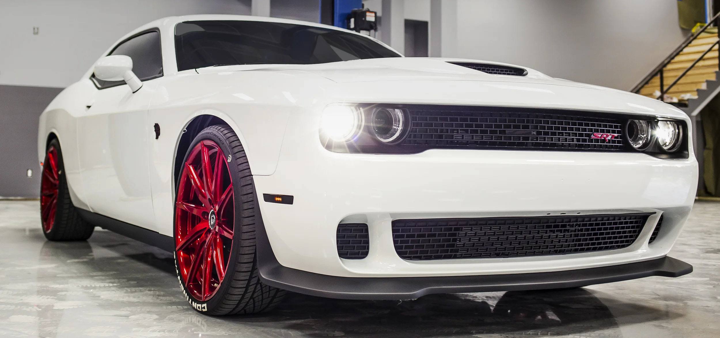 PERFORMANCE UPGRADES Do you live in the Carolinas and want your car to go faster? Our experienced technicians do performance installs to increase top speed, horsepower, and torque all the time. We pushed the Dodge Challenger HellCat (pictured above) to over 800 horsepower. Our Performance Installations include services like: Cold Air Intake, Larger Diameter Throttle Body, Exhaust Header, High-Flow Catalytic Converter, High-Flow Cat-Back Exhaust System, Performance Chips & Programmers, Forced Induction (Superchargers & Turbochargers).