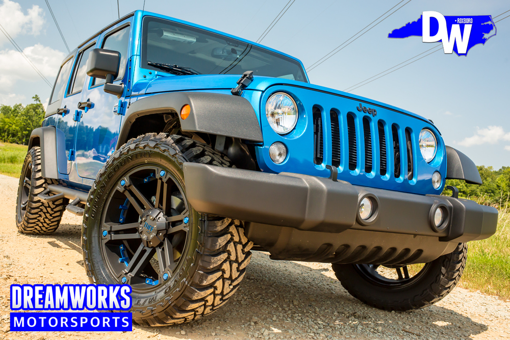 Blue Jeep Wrangler — Dreamworks Motorsports