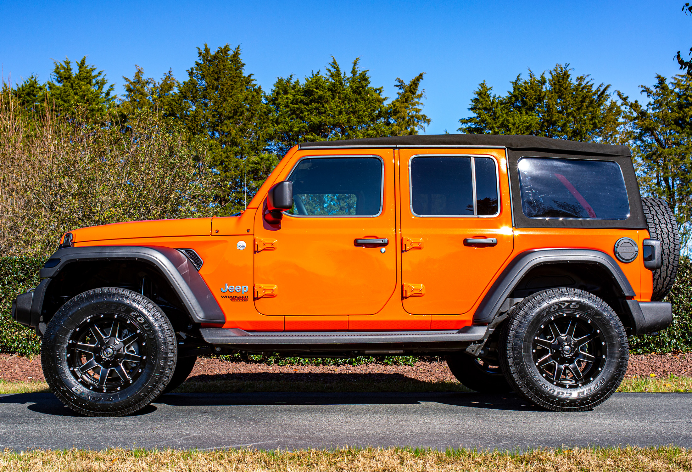 Orange JL Wrangler Jeep — Dreamworks Motorsports