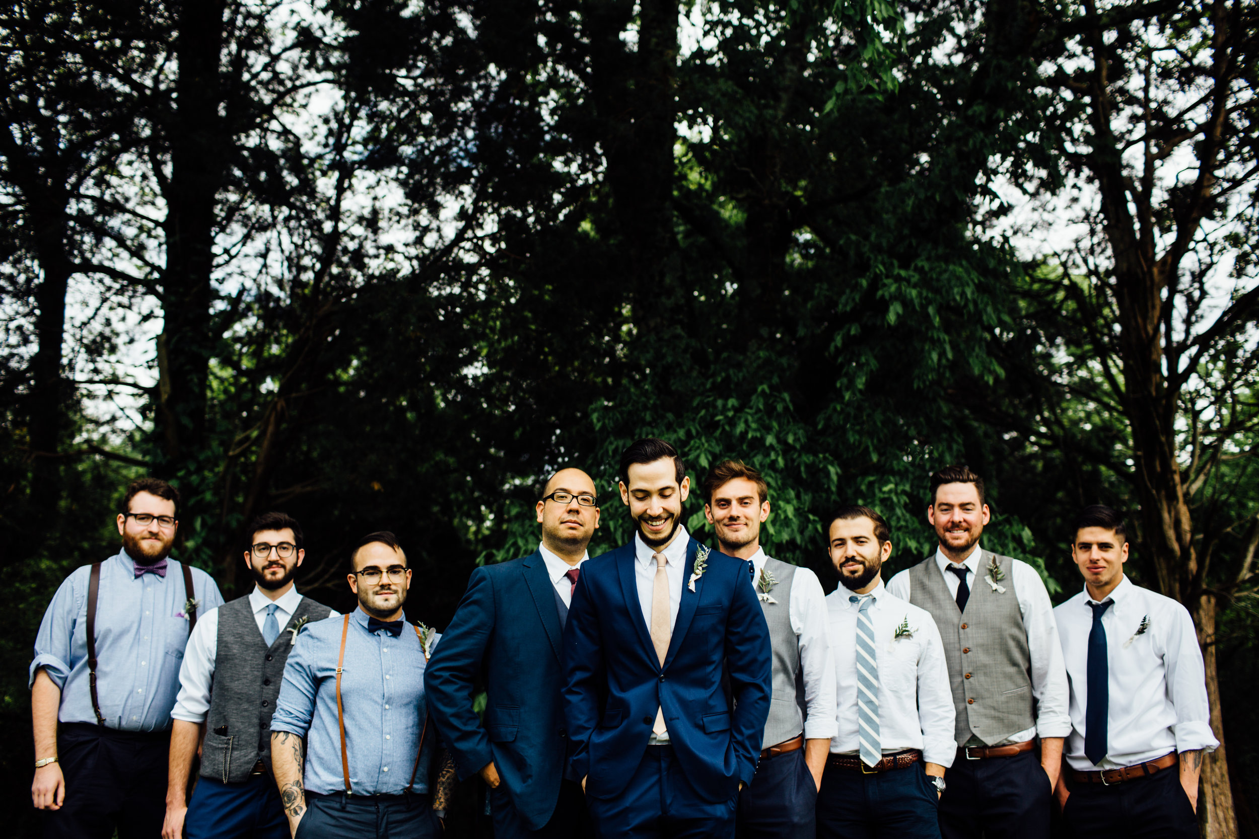 groomsmen in the forest
