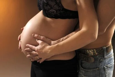 pregnant-woman-hands-on-belly.jpg